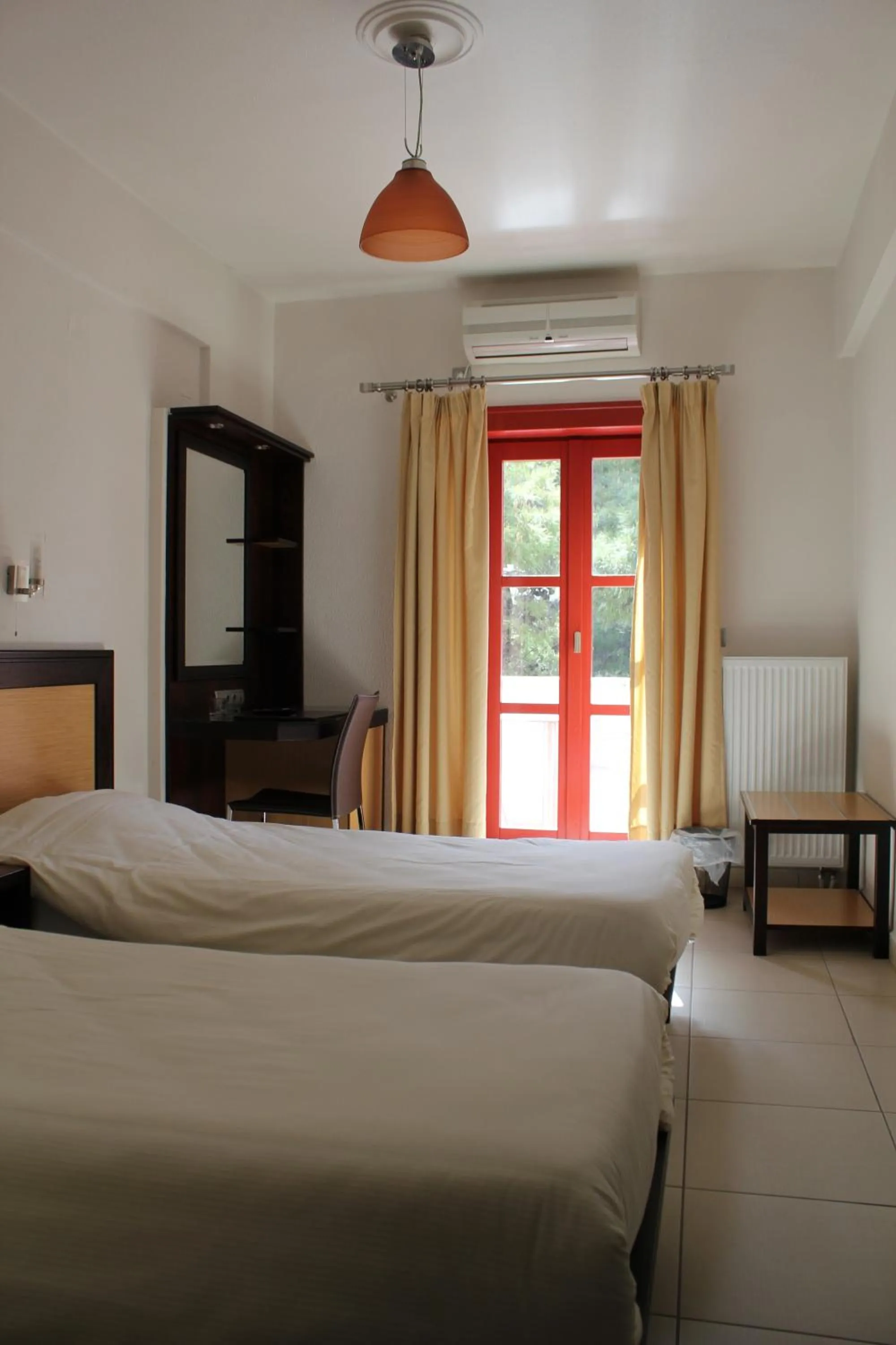 Bed in Aposperides Hotel