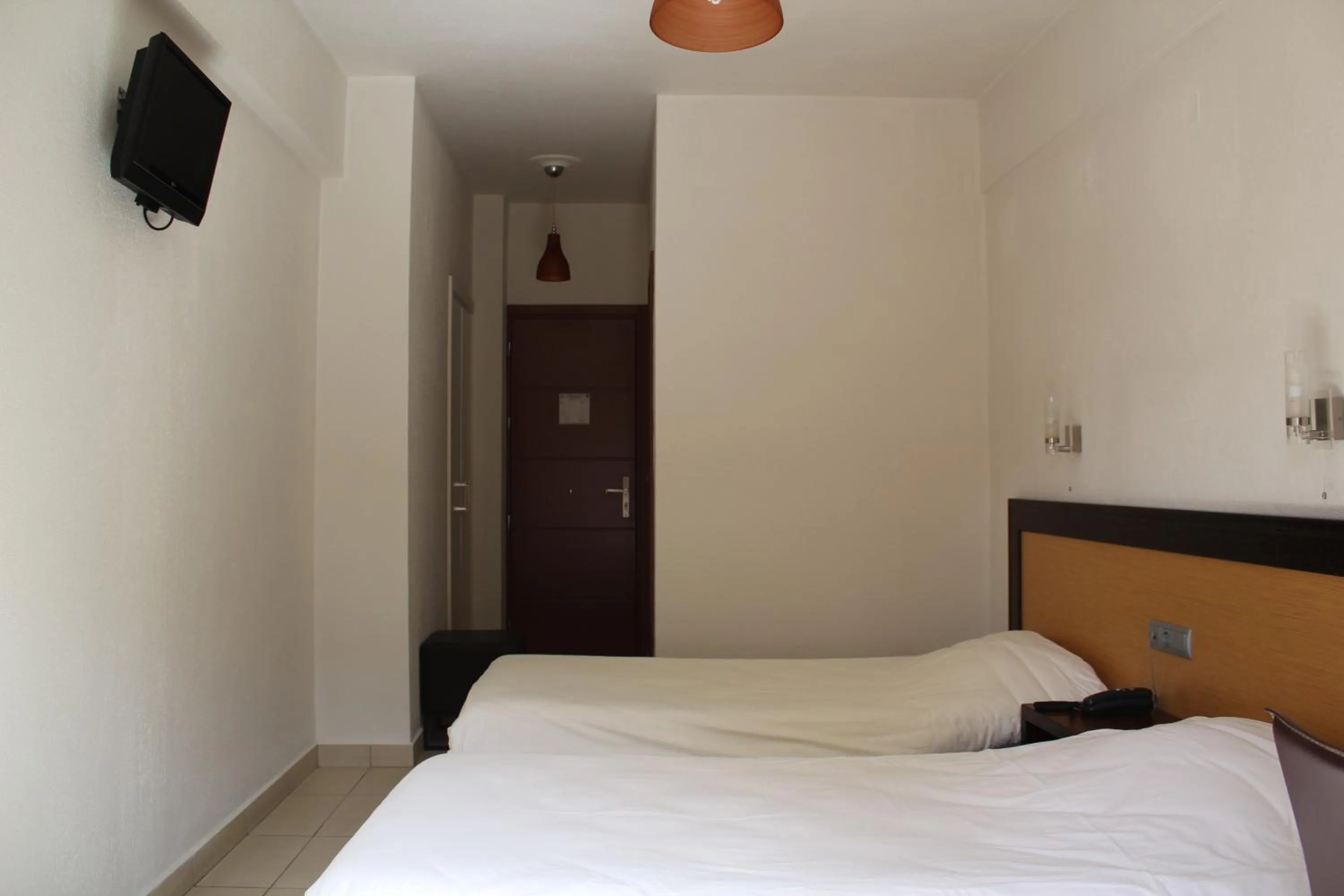 Bed in Aposperides Hotel