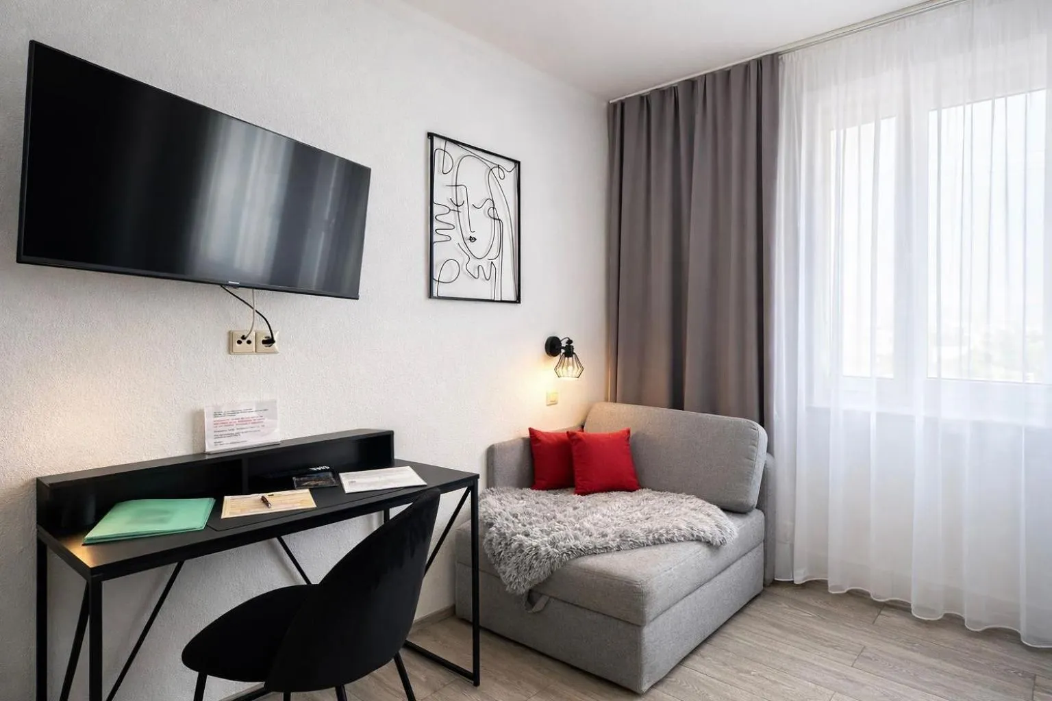 Seating area, Bed in Gästehaus Kühnle