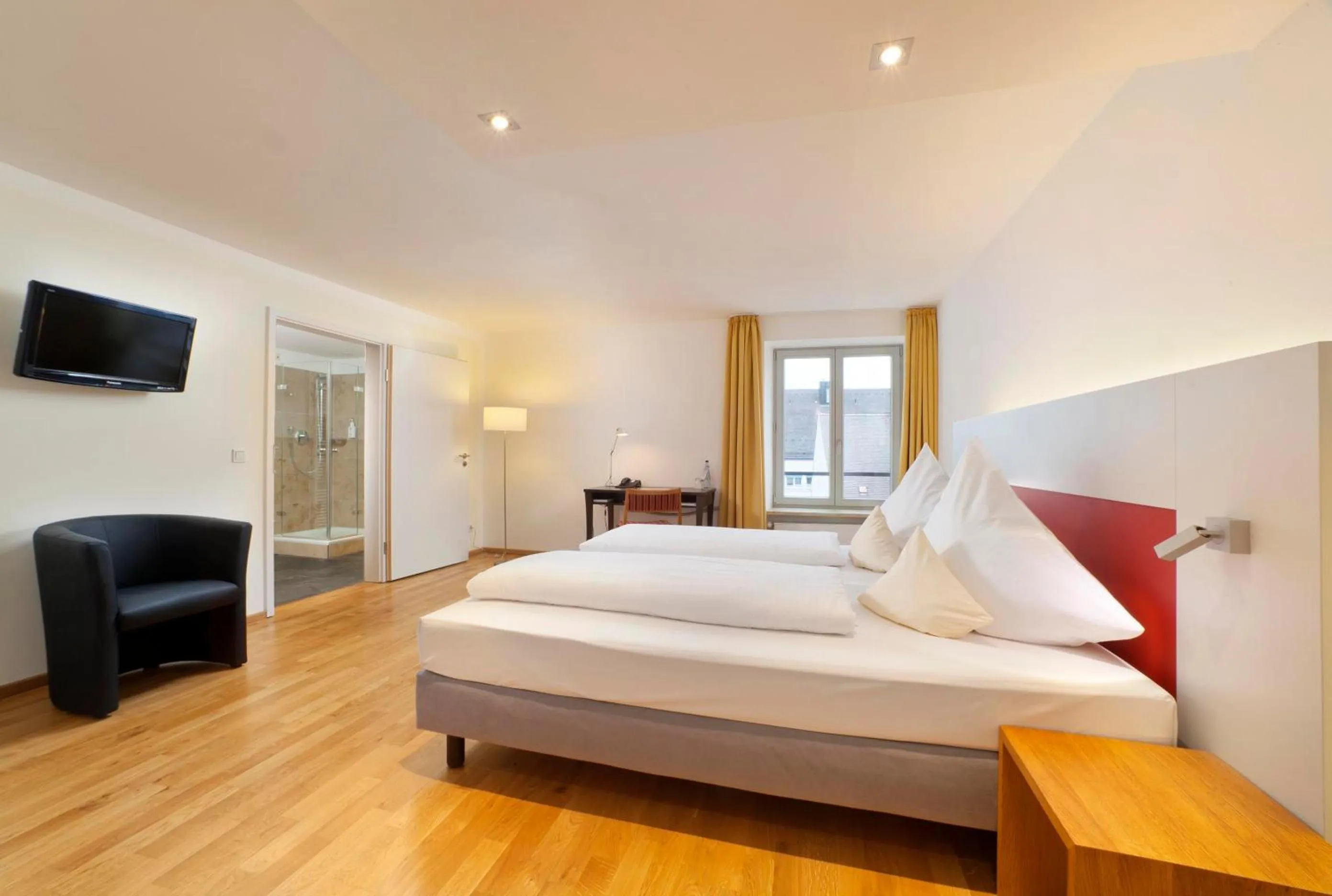 Photo of the whole room, Bed in AKZENT Brauerei Hotel Hirsch