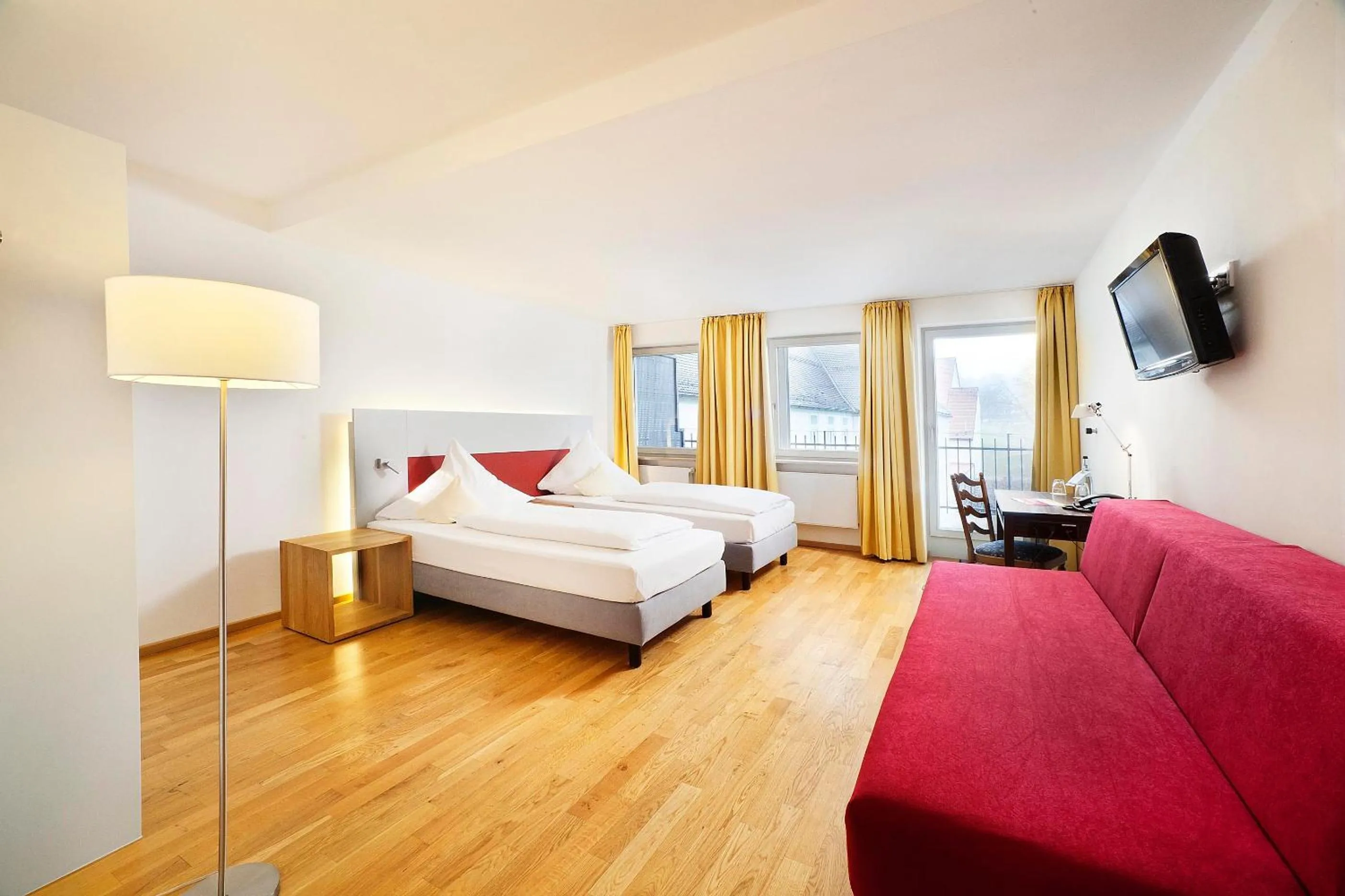 Photo of the whole room, Bed in AKZENT Brauerei Hotel Hirsch