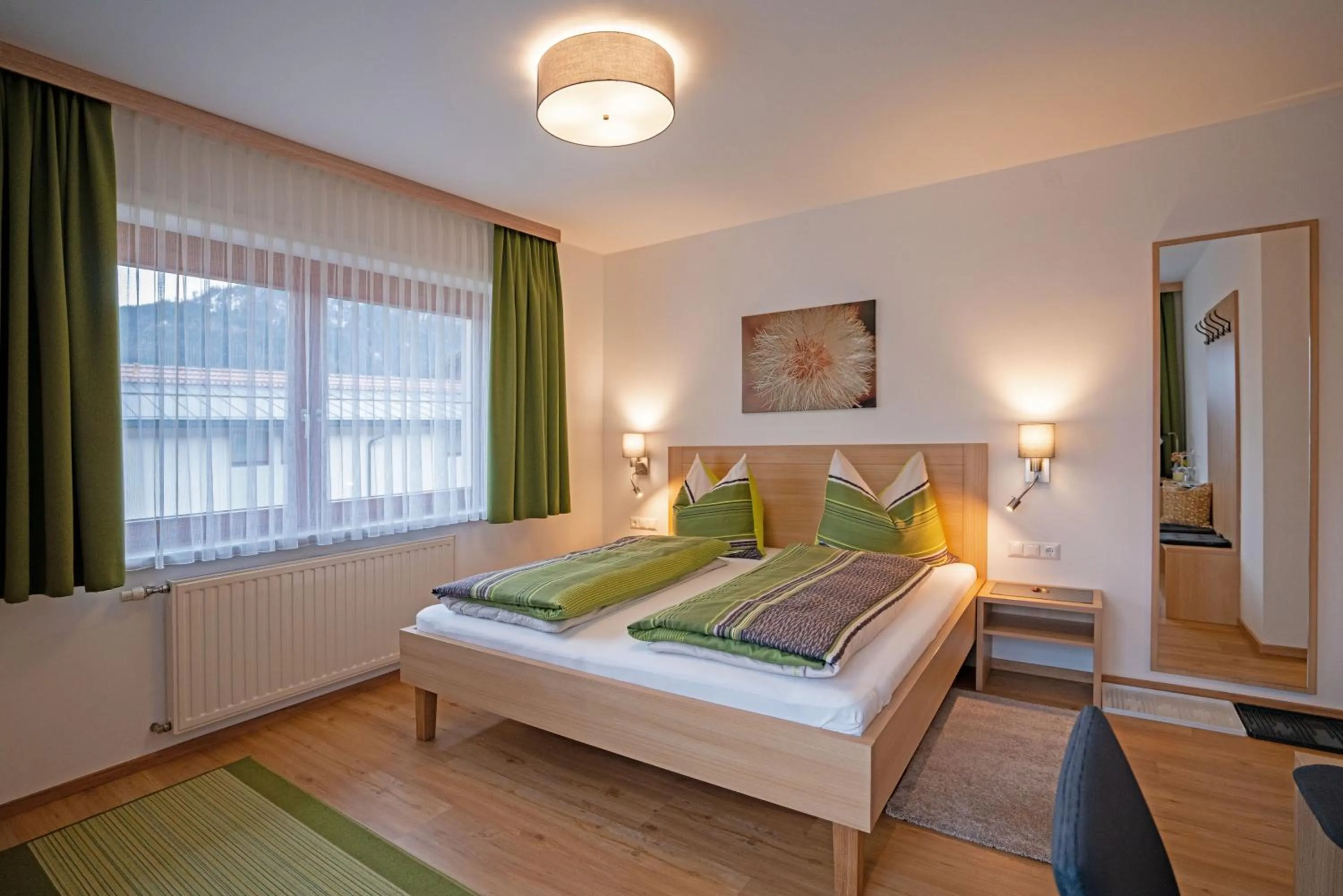 Bed in Haus Lackner am Weissensee in Kärnten