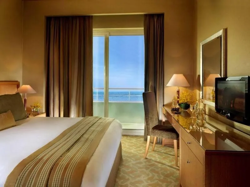 Bed in TIME Ruby Hotel Apartment