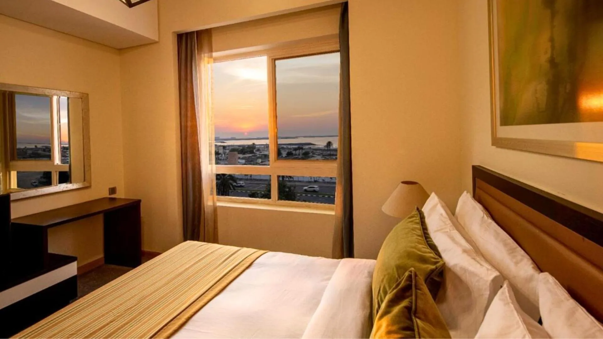 Bed in TIME Ruby Hotel Apartment