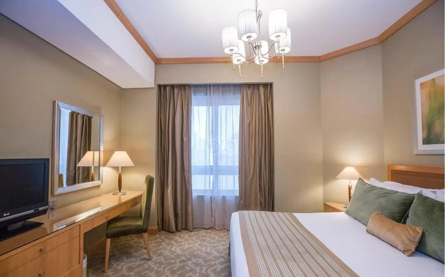 Bed in TIME Ruby Hotel Apartment