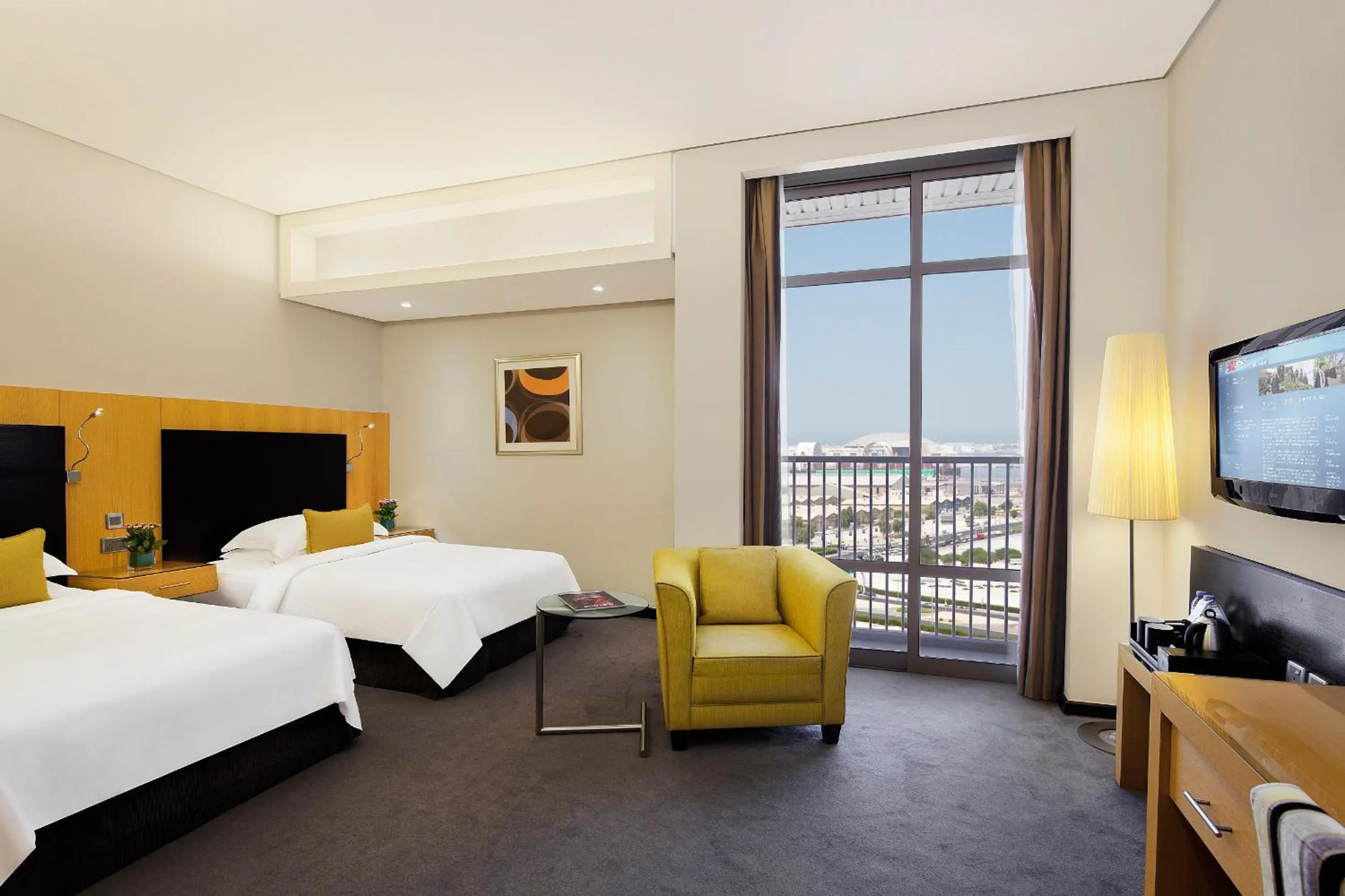 Balcony/Terrace, Bed in Hala Arjaan by Rotana, Deluxe Hotel Apartments