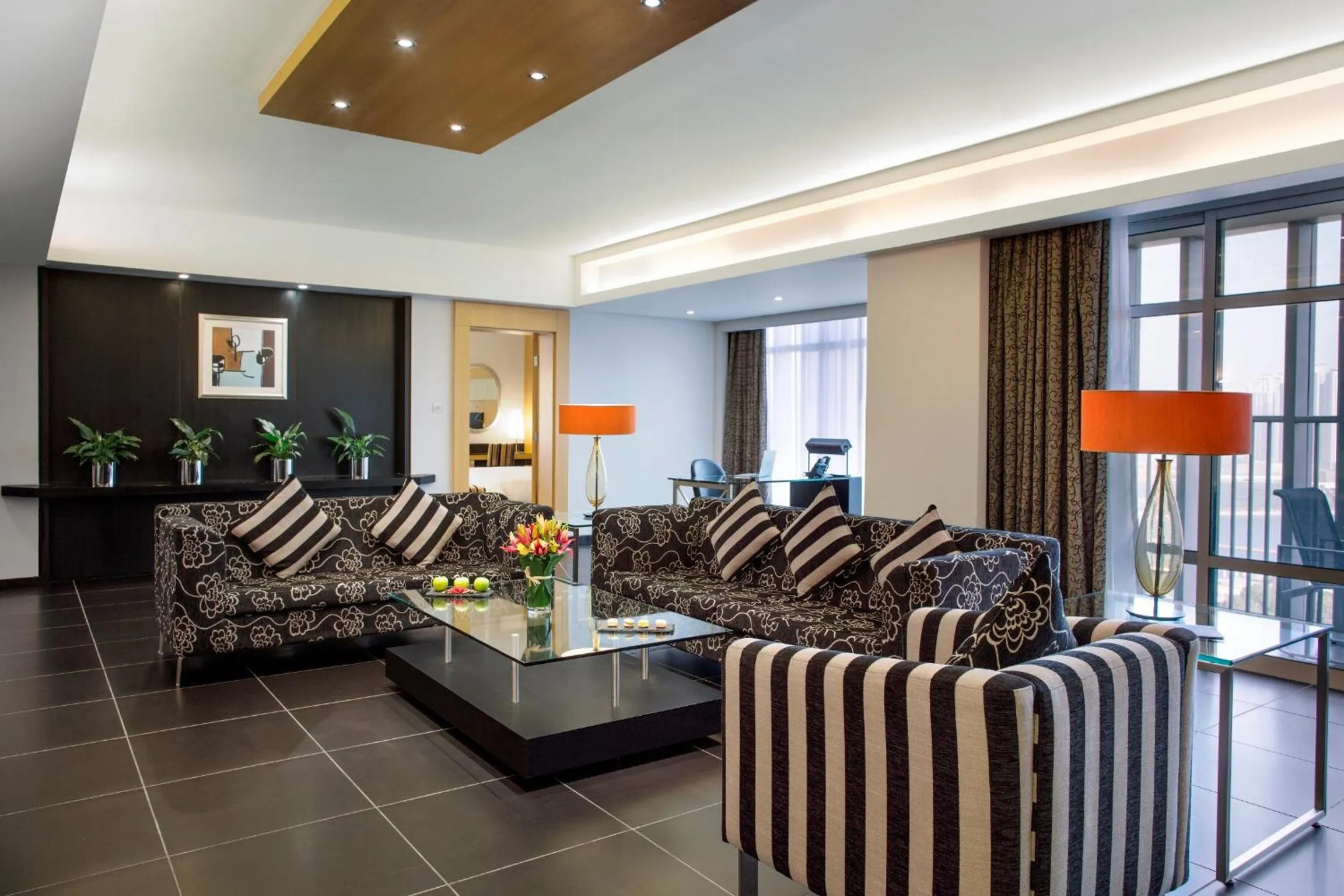 Living room in Hala Arjaan by Rotana, Deluxe Hotel Apartments