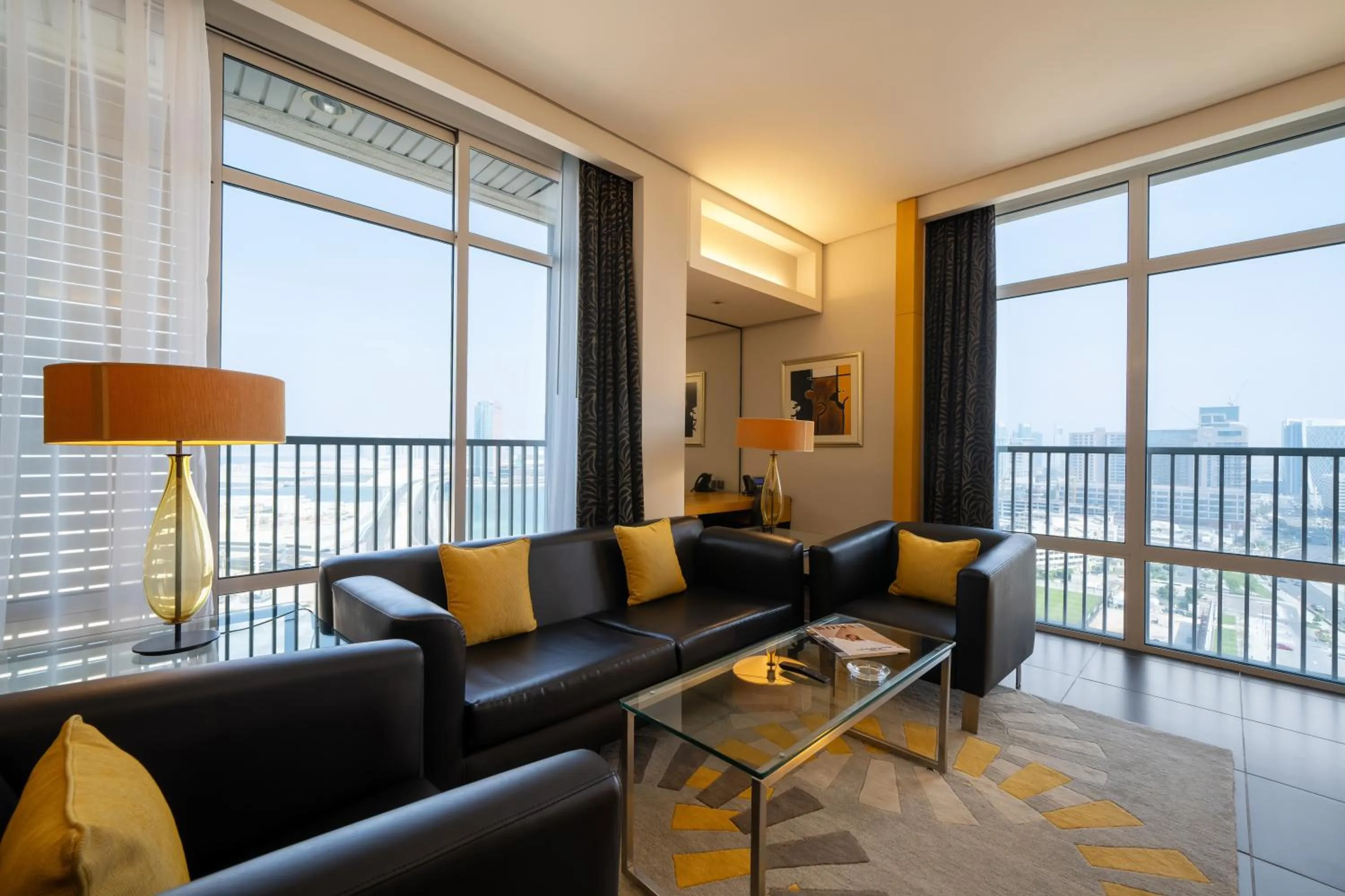 Seating area in Hala Arjaan by Rotana, Deluxe Hotel Apartments