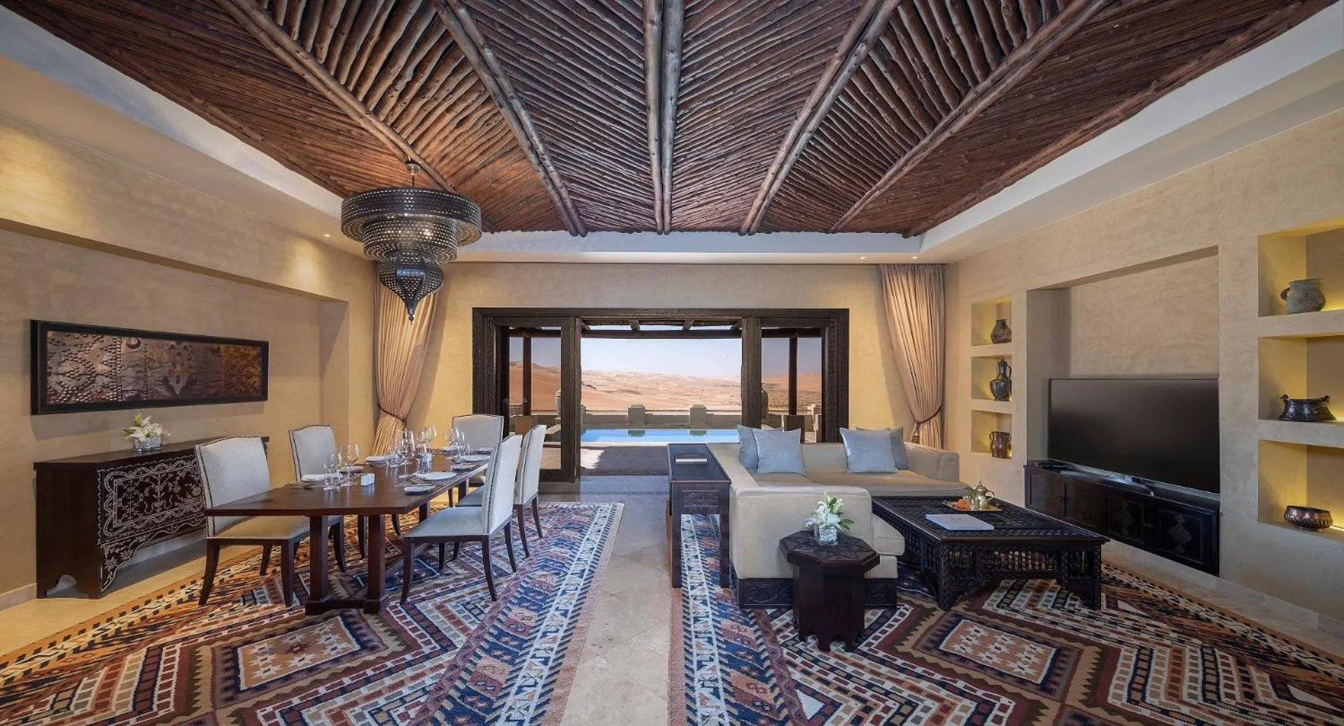 Living room, Bed in Anantara Qasr al Sarab Desert Resort