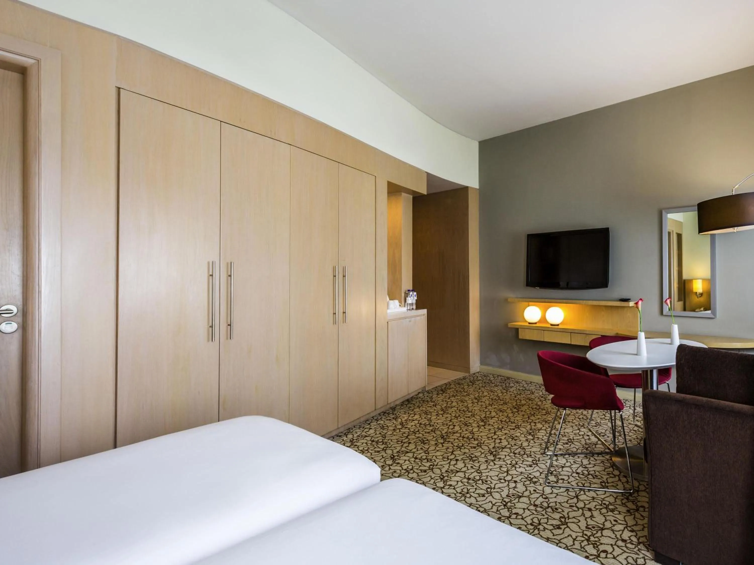 Bedroom, Bed in Novotel Suites Mall Avenue Dubai