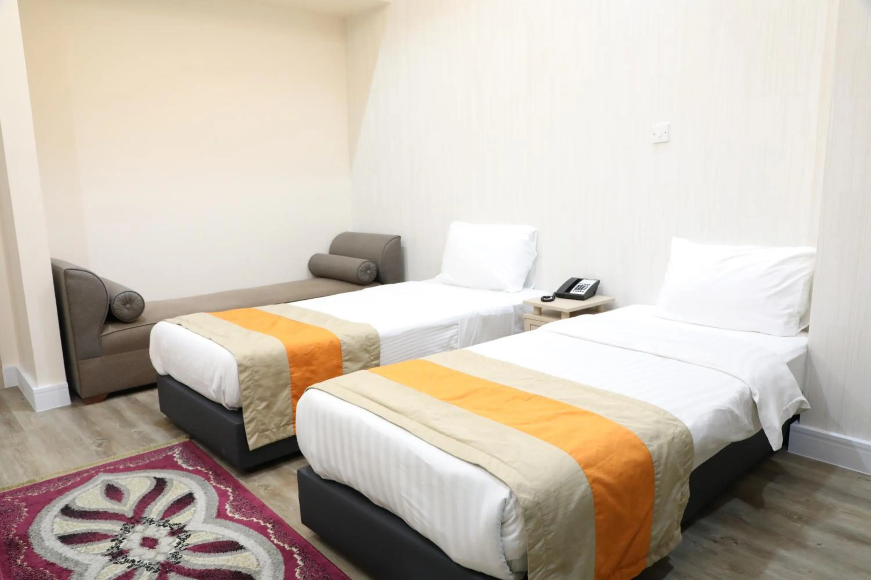 Bed in Wescott Plaza Hotel Apartments LLC Formerly West Zone Plaza Hotel Apts