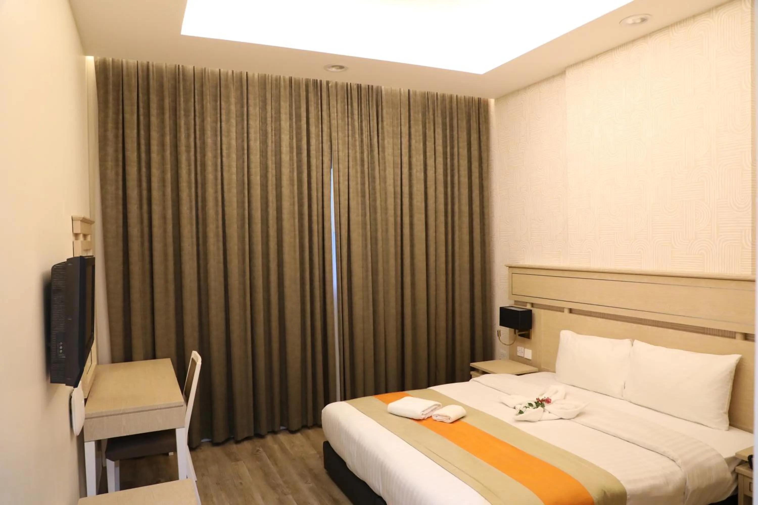 Bed in Wescott Plaza Hotel Apartments LLC Formerly West Zone Plaza Hotel Apts