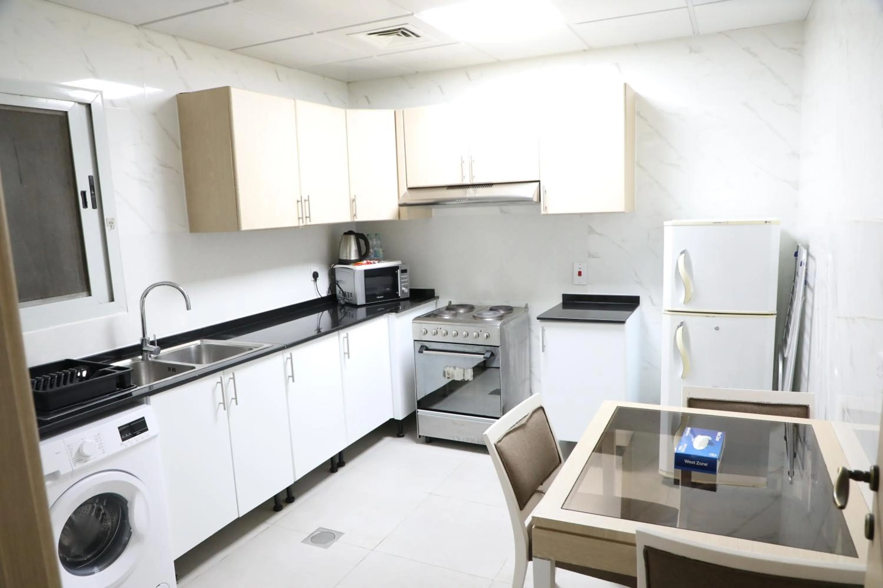 Kitchen or kitchenette in Wescott Plaza Hotel Apartments LLC Formerly West Zone Plaza Hotel Apts
