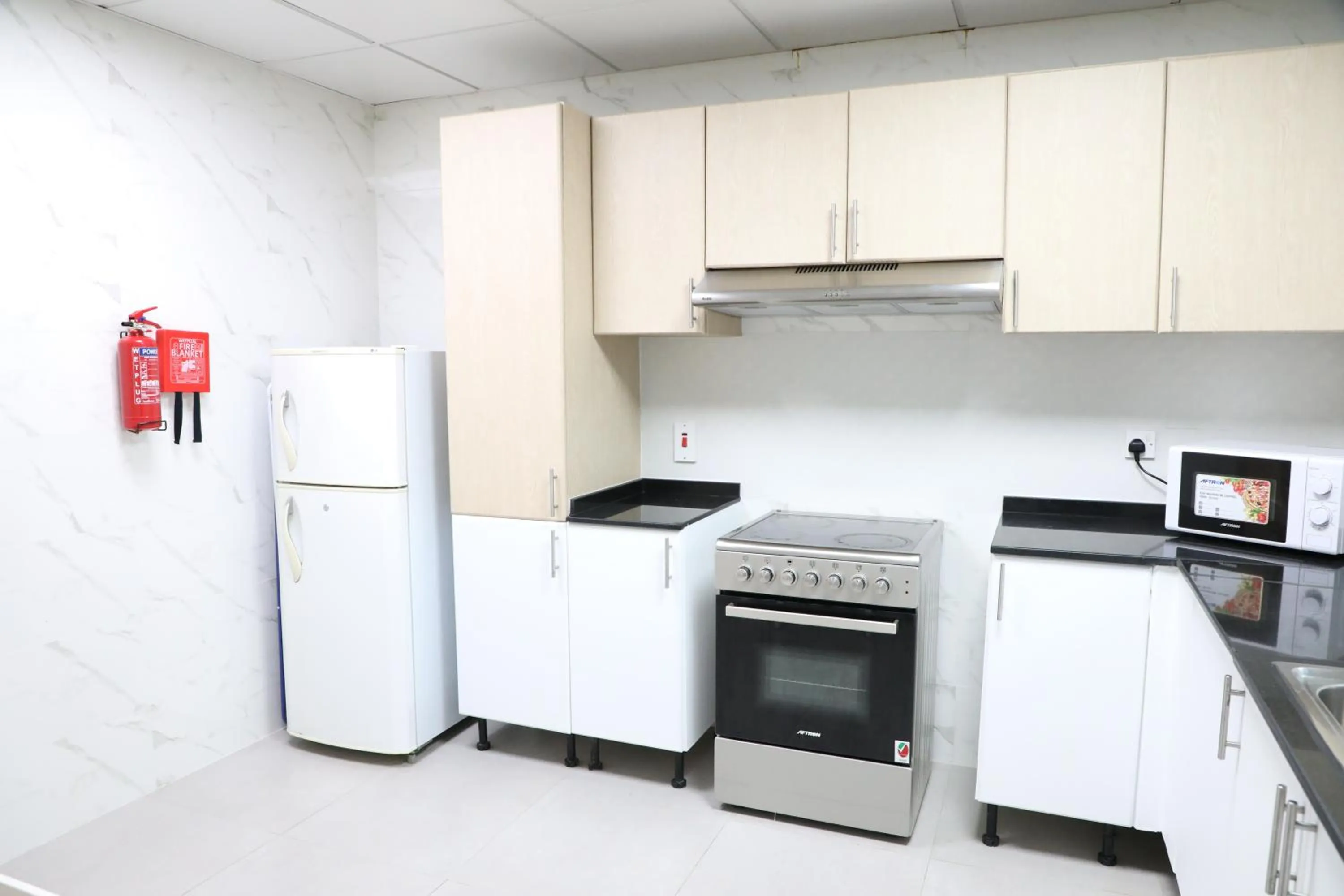 Kitchen or kitchenette in Wescott Plaza Hotel Apartments LLC Formerly West Zone Plaza Hotel Apts