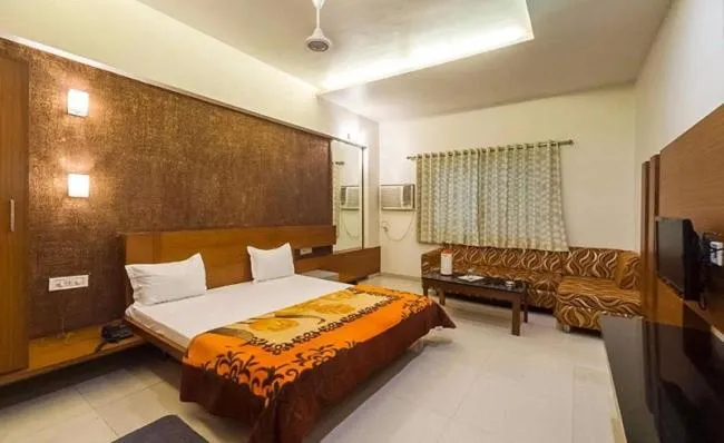 Bed in Hotel Rajmandir