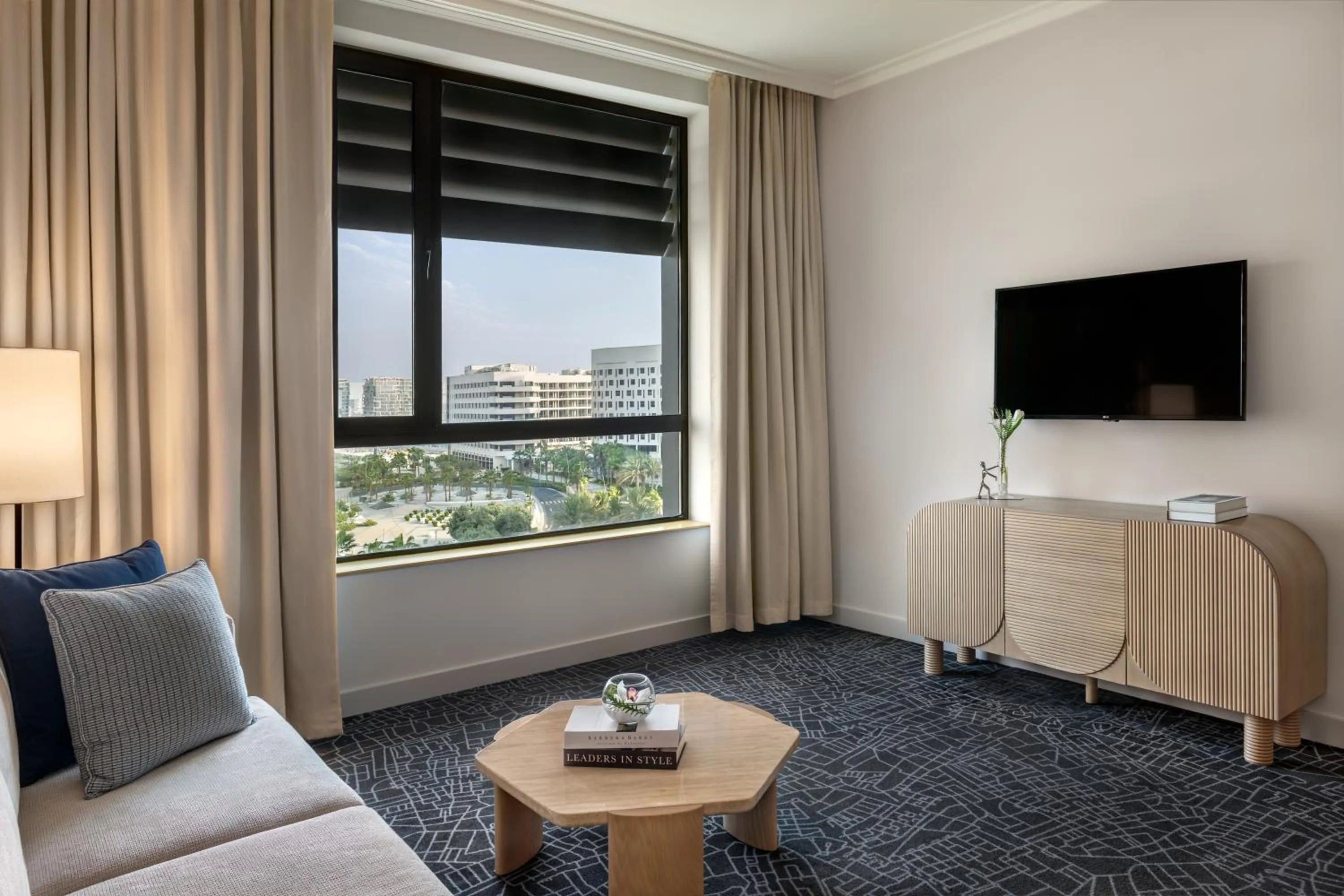 Living room in Yas Plaza Bay by IHG