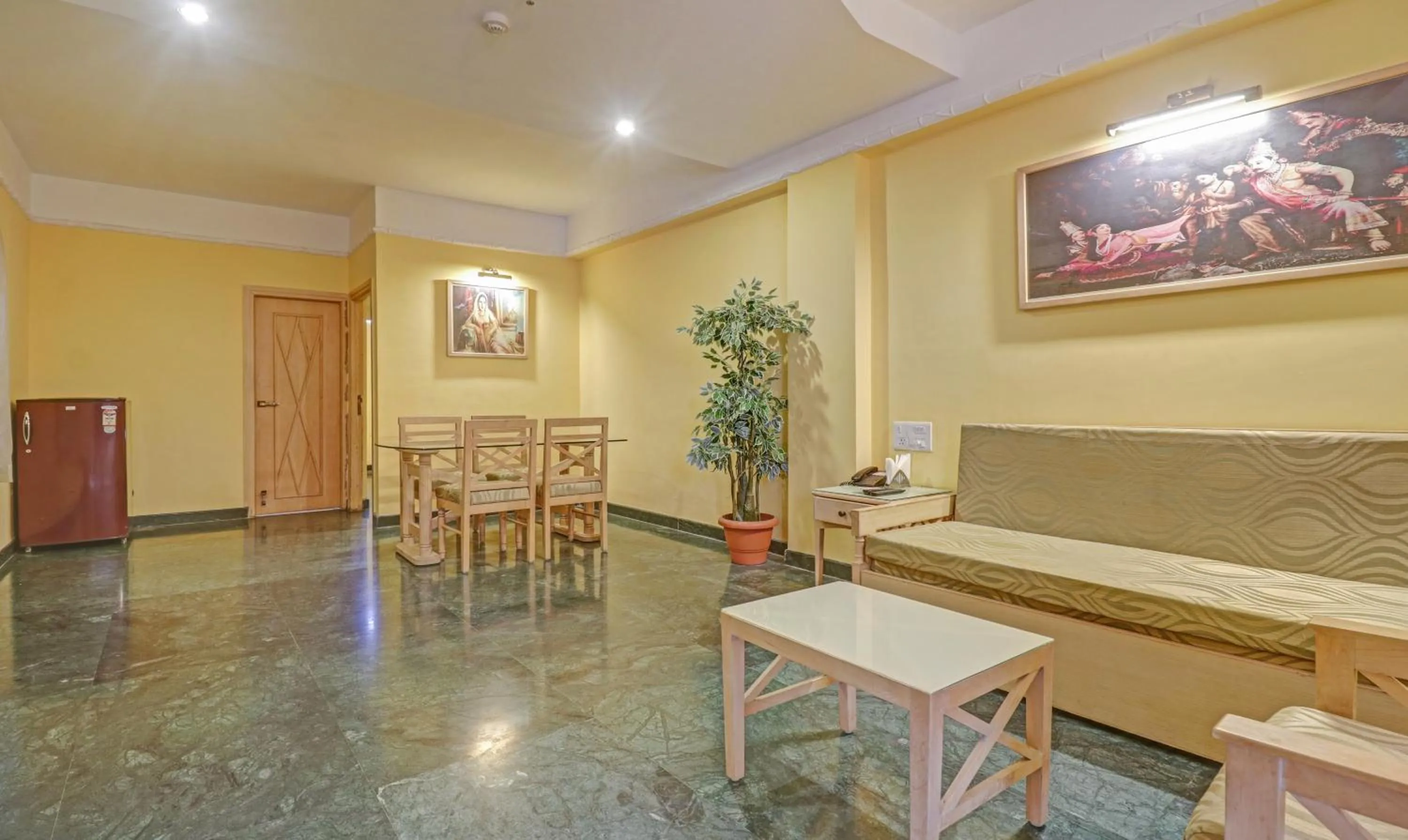 Living room in Treebo Komfort Suites, 3 Km From Mysore Palace