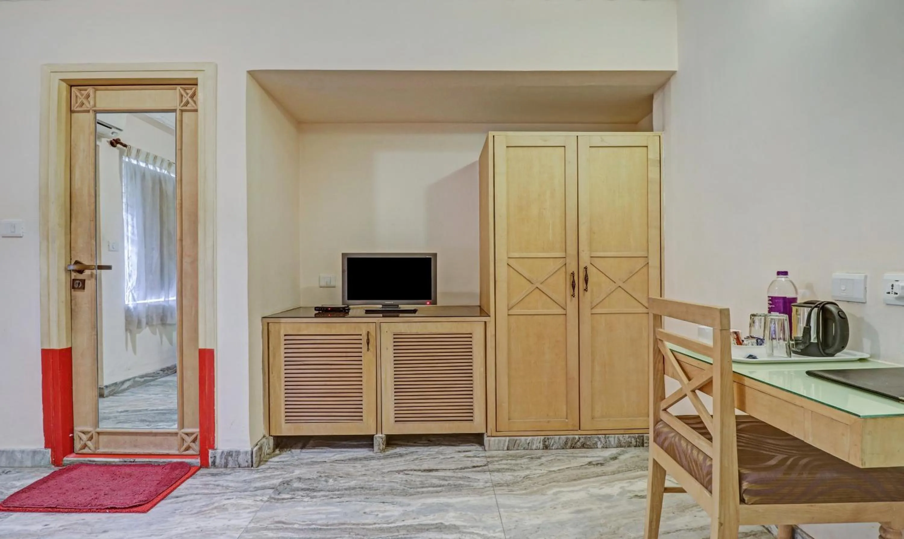 Bedroom in Treebo Komfort Suites, 3 Km From Mysore Palace