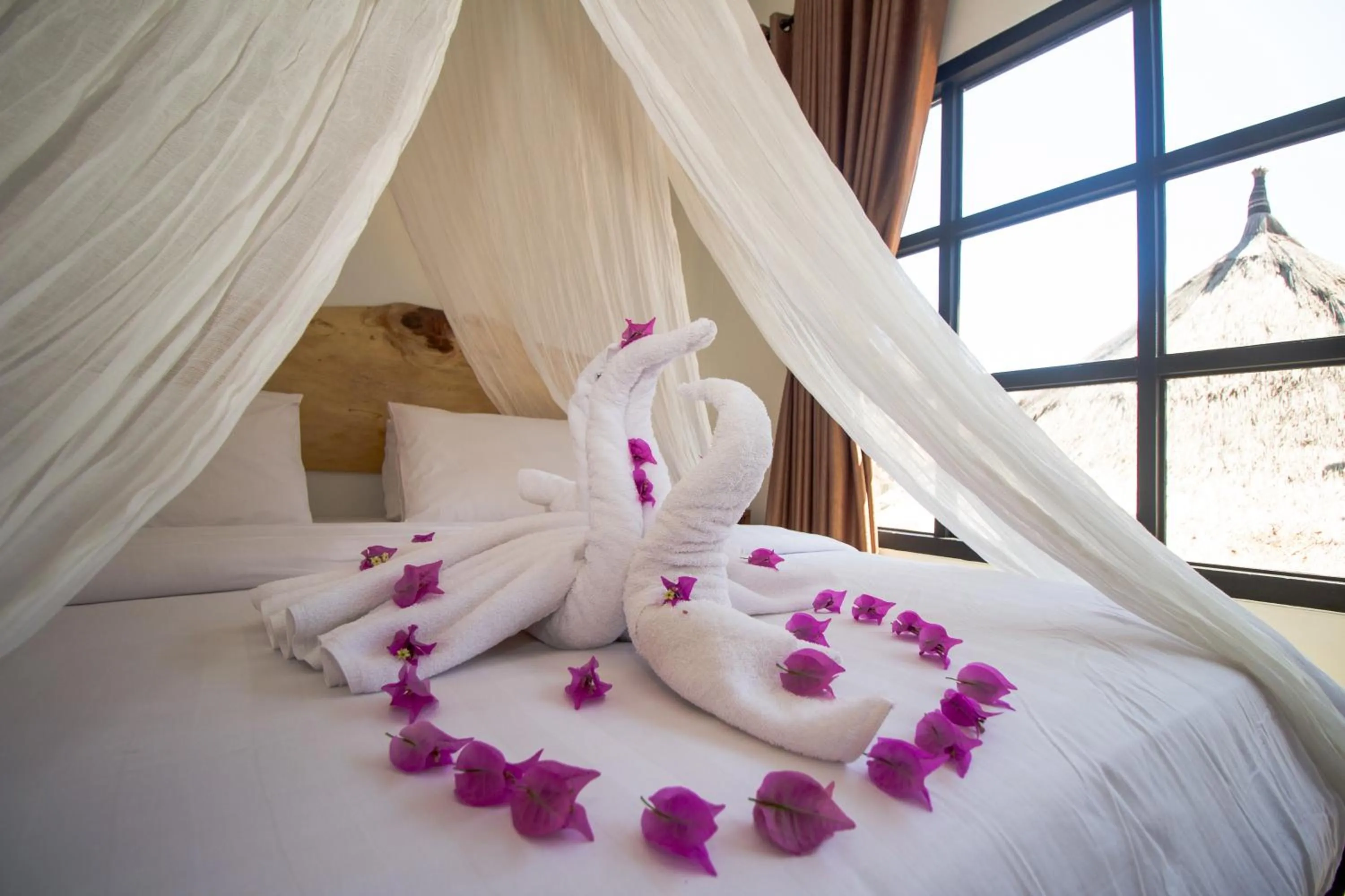 Bed in Gili Breeze Tropical Bungalows