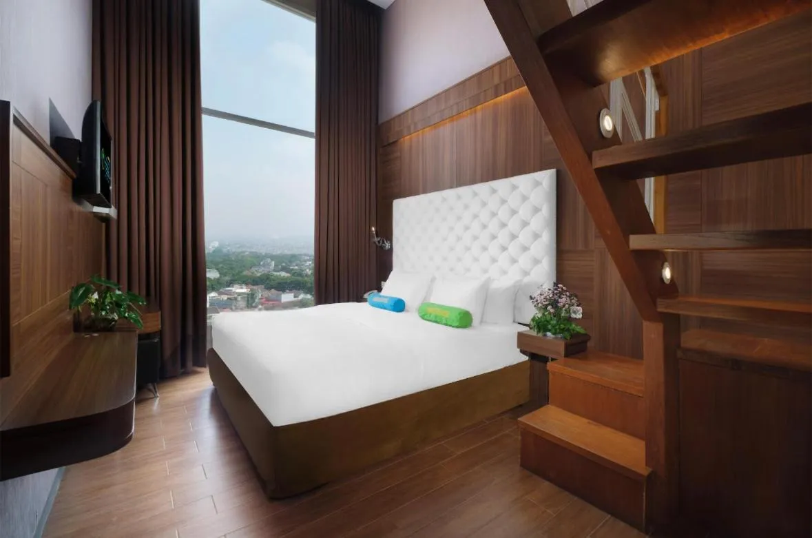 Bed in Grand Tebu Hotel