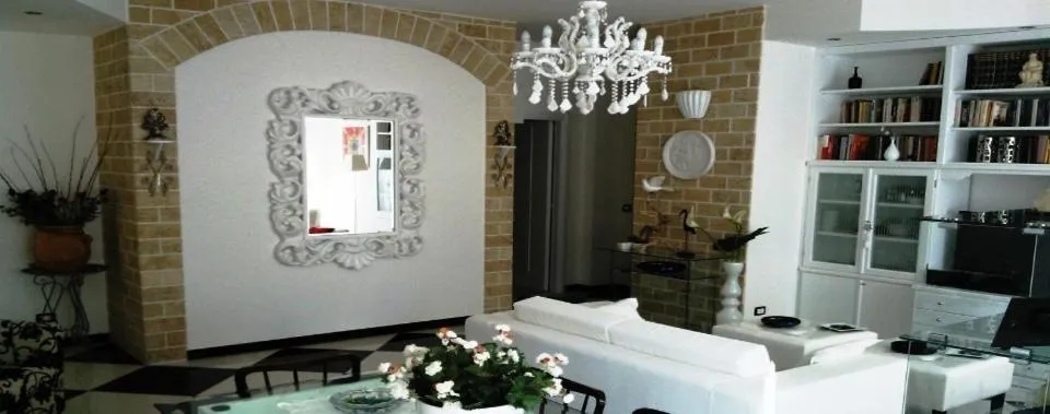 Communal lounge/ TV room in B&B Lido