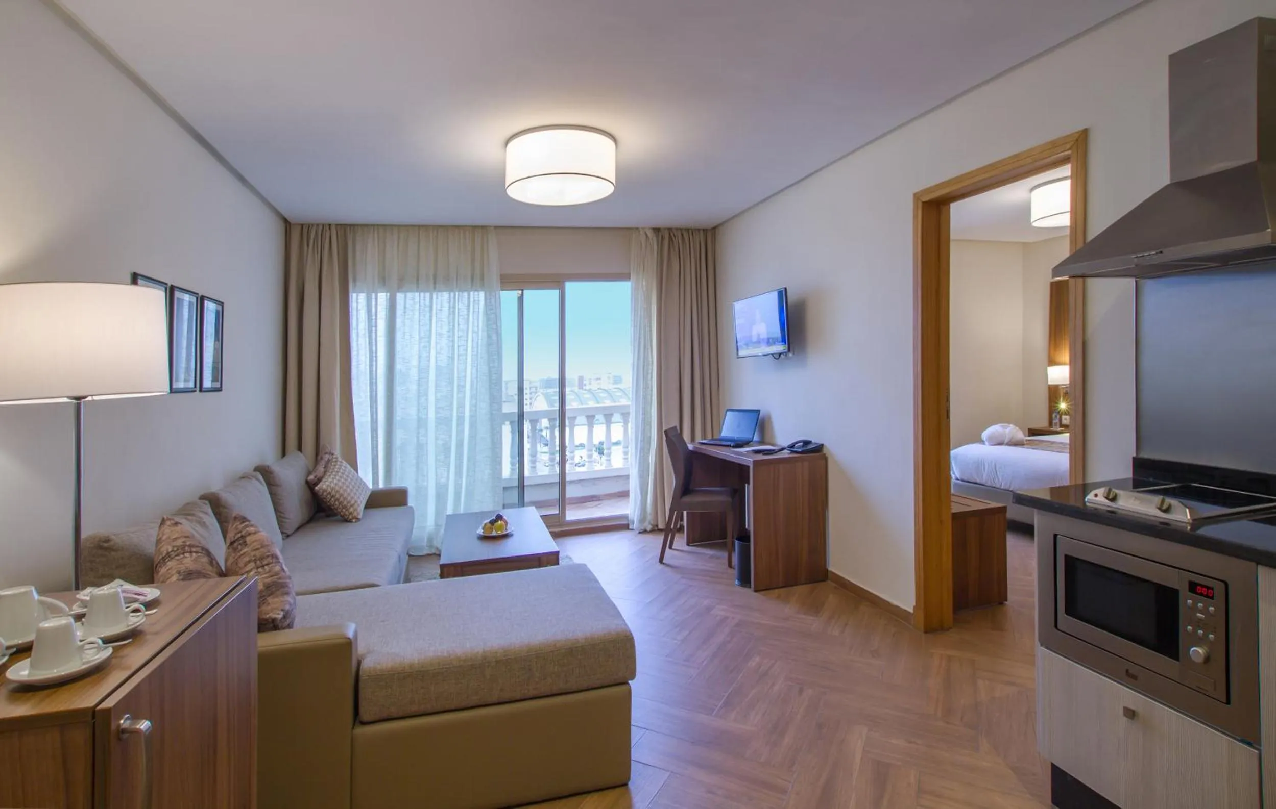 Living room, Bed in Melliber Appart Hotel