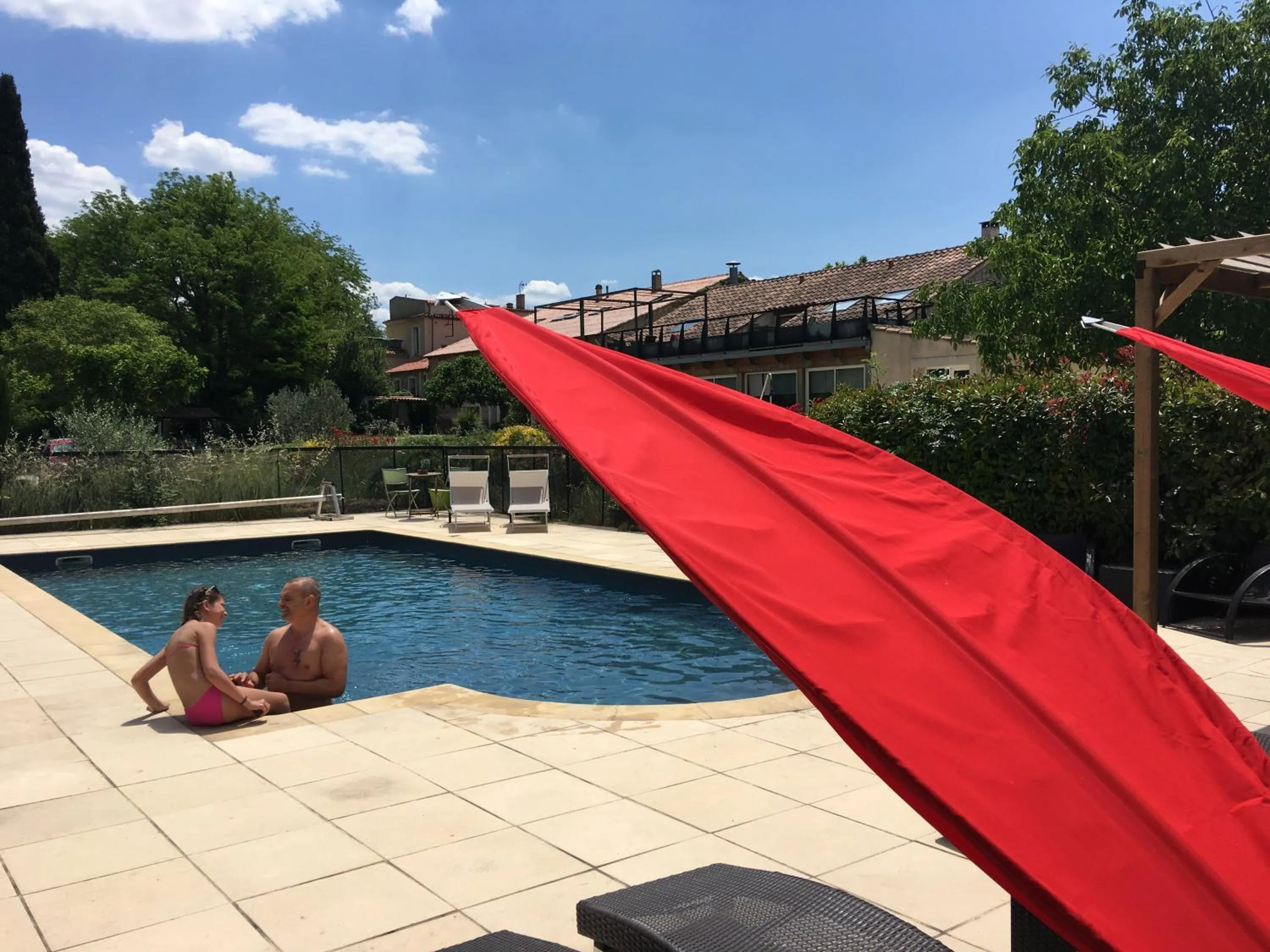 Swimming pool in Logis Hôtel & Spa Déjeunez Sous L'Arbre