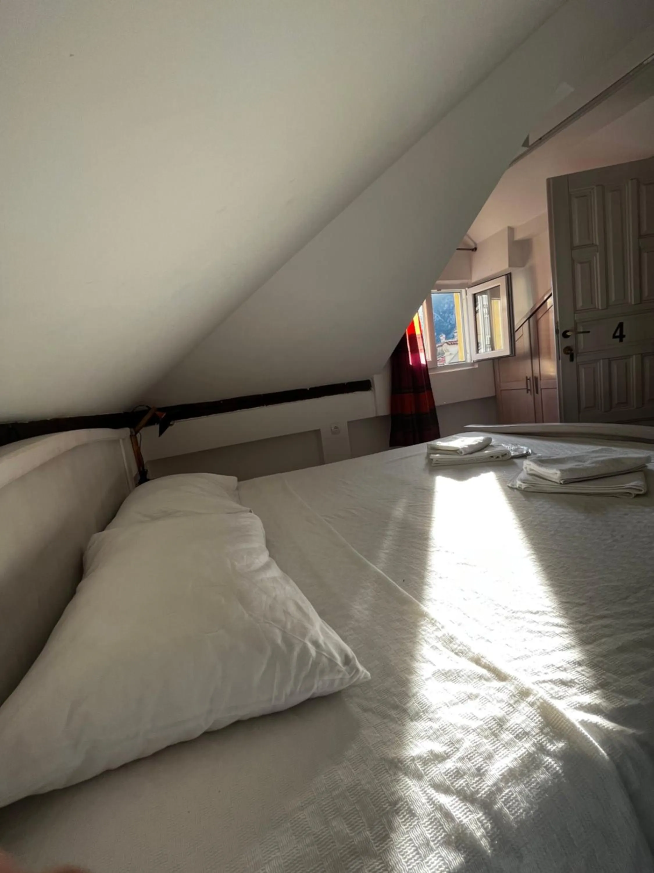 Bed in Athos Guesthouse