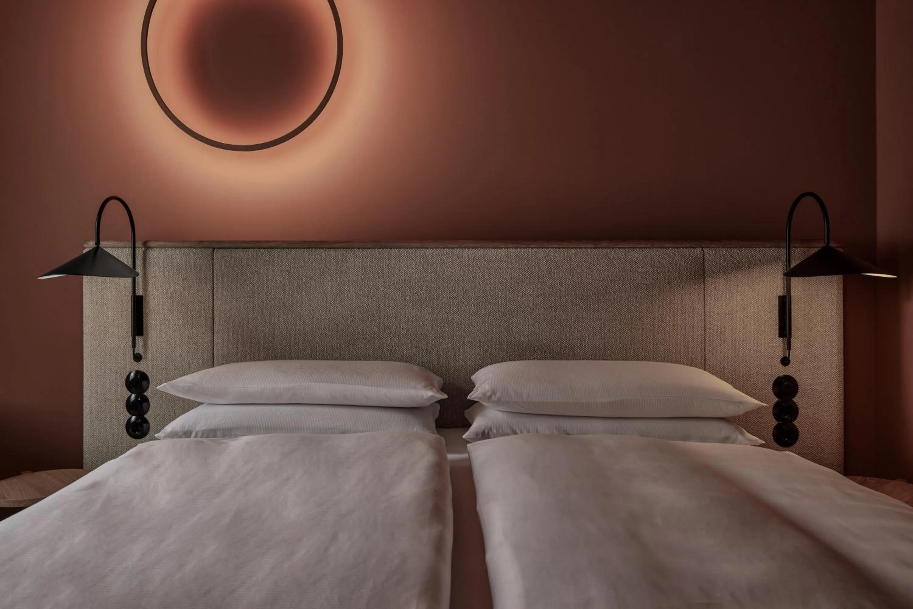 Bed in ADELANTE Boutique Hotel