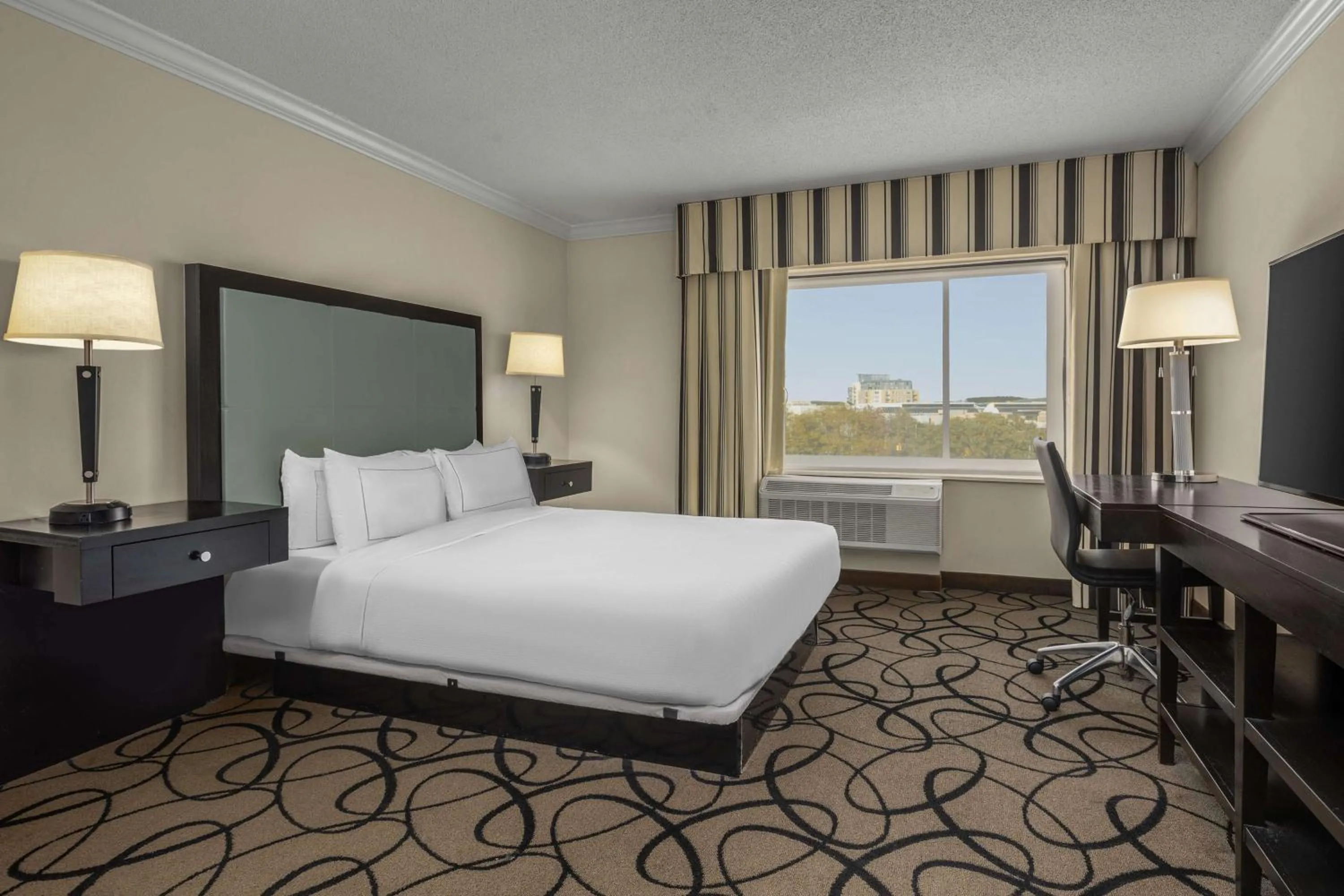 Bed in The Verve Boston Natick, Tapestry Collection by Hilton