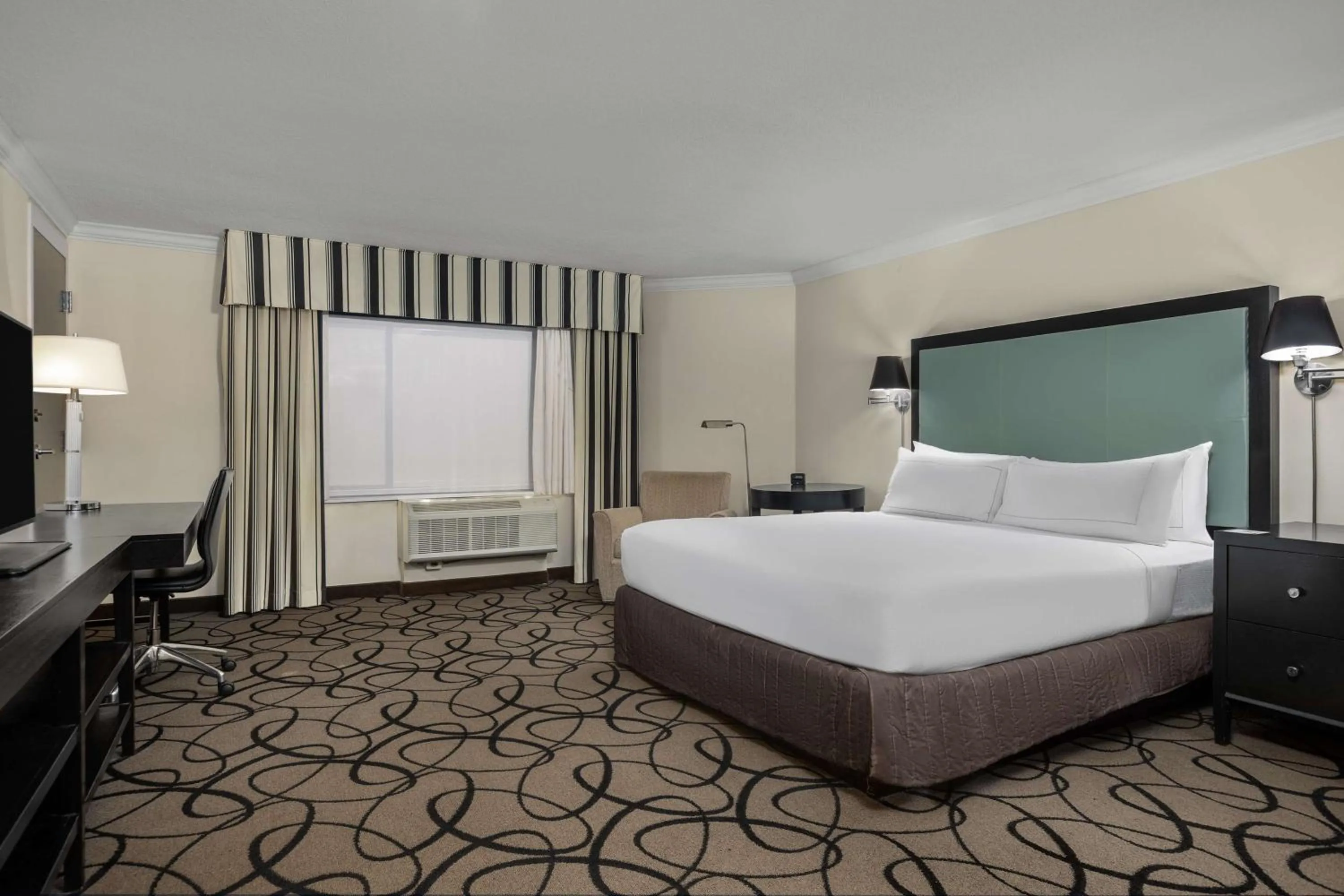 Bed in The Verve Boston Natick, Tapestry Collection by Hilton