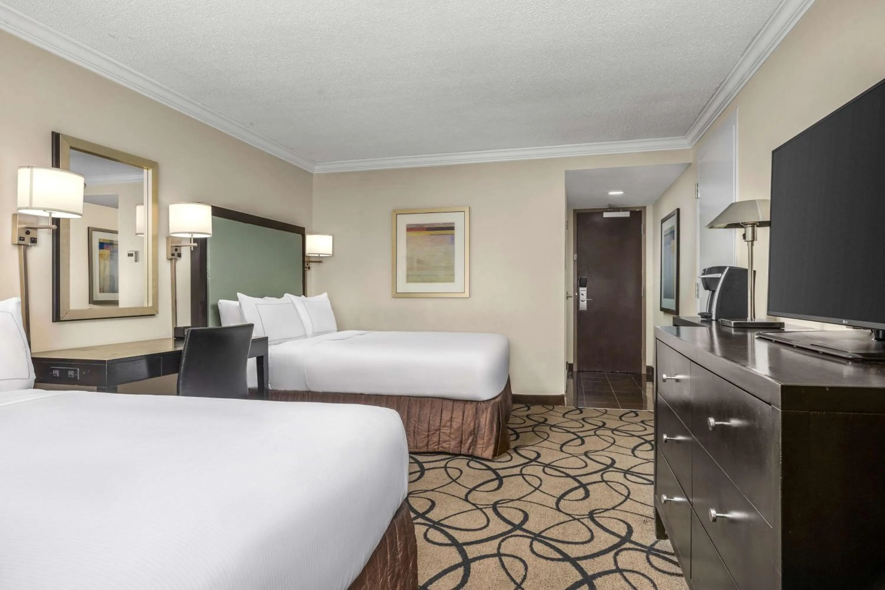 Bed in The Verve Boston Natick, Tapestry Collection by Hilton