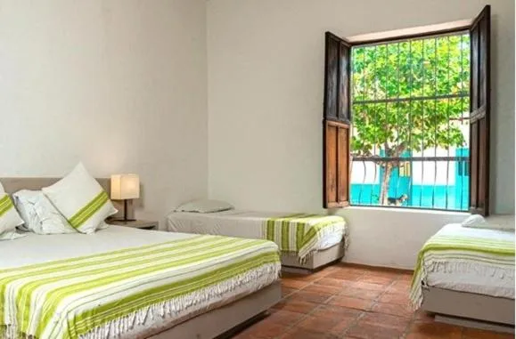 Bed in Hotel San German