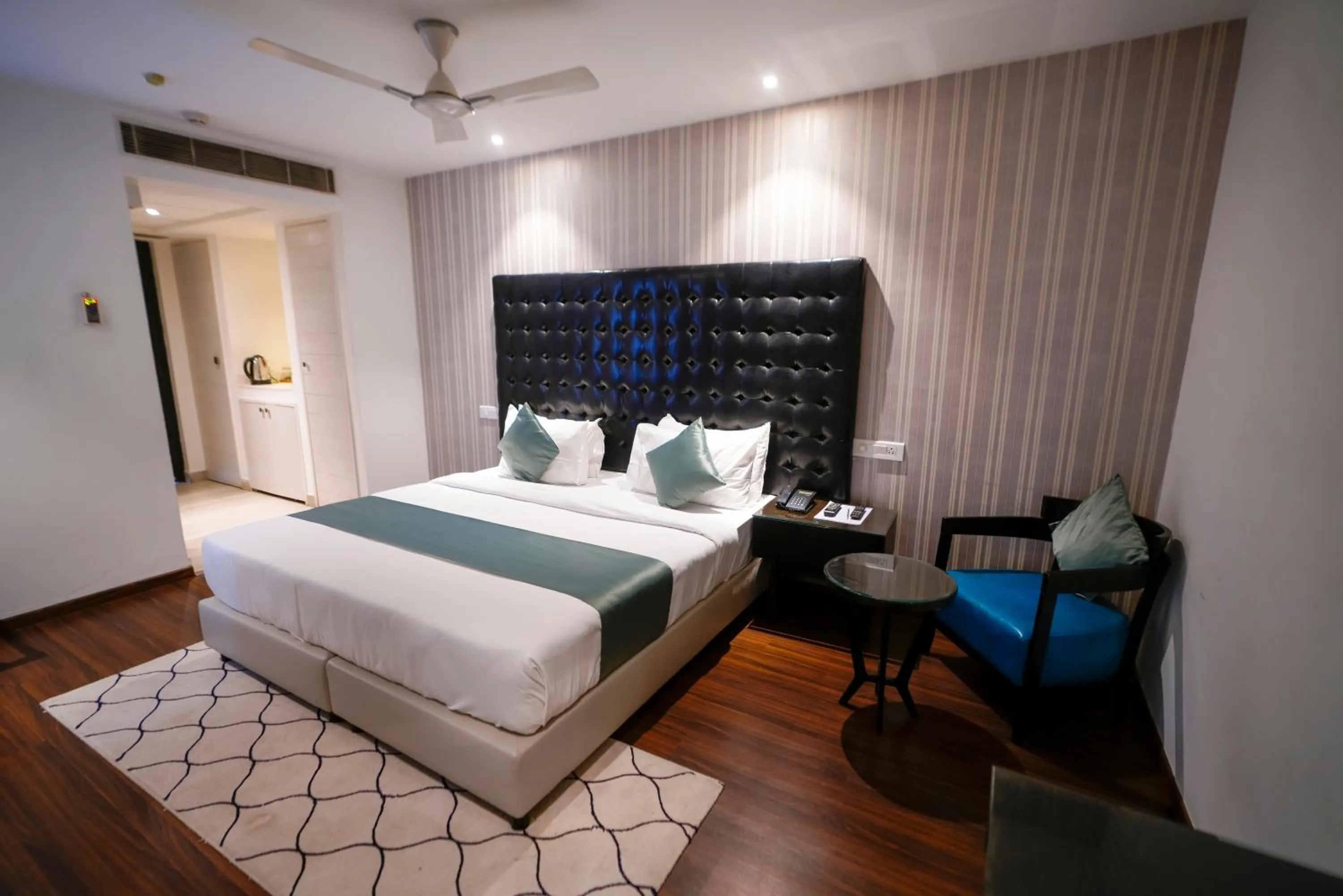 Photo of the whole room, Bed in Hotel Deccan Serai, HITEC CITY, HYDERABAD