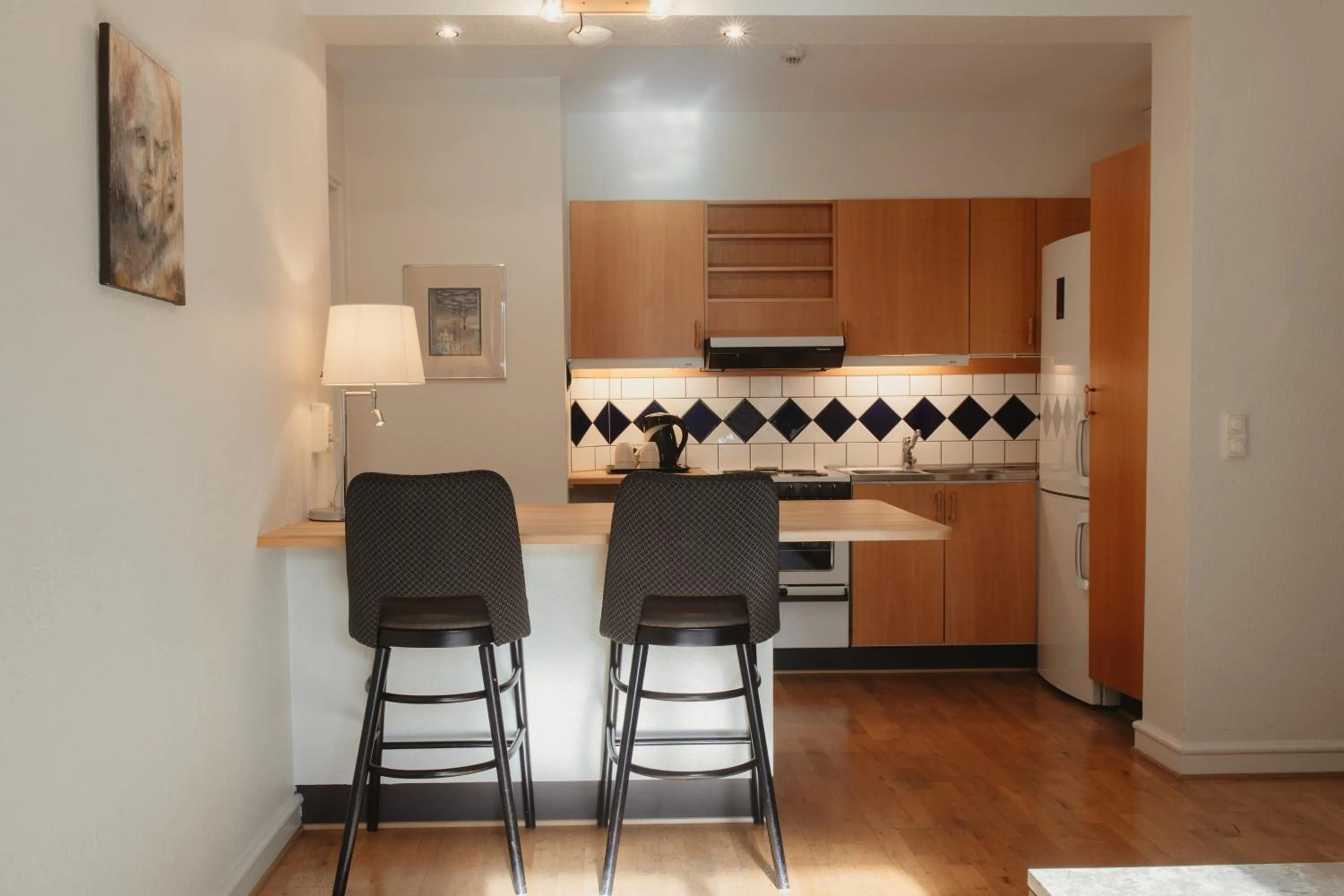 Kitchen or kitchenette in Home Hotel Norre Park