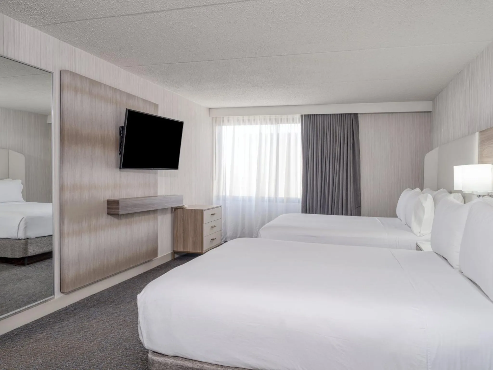 Photo of the whole room, Bed in Crowne Plaza Indianapolis-Airport by IHG