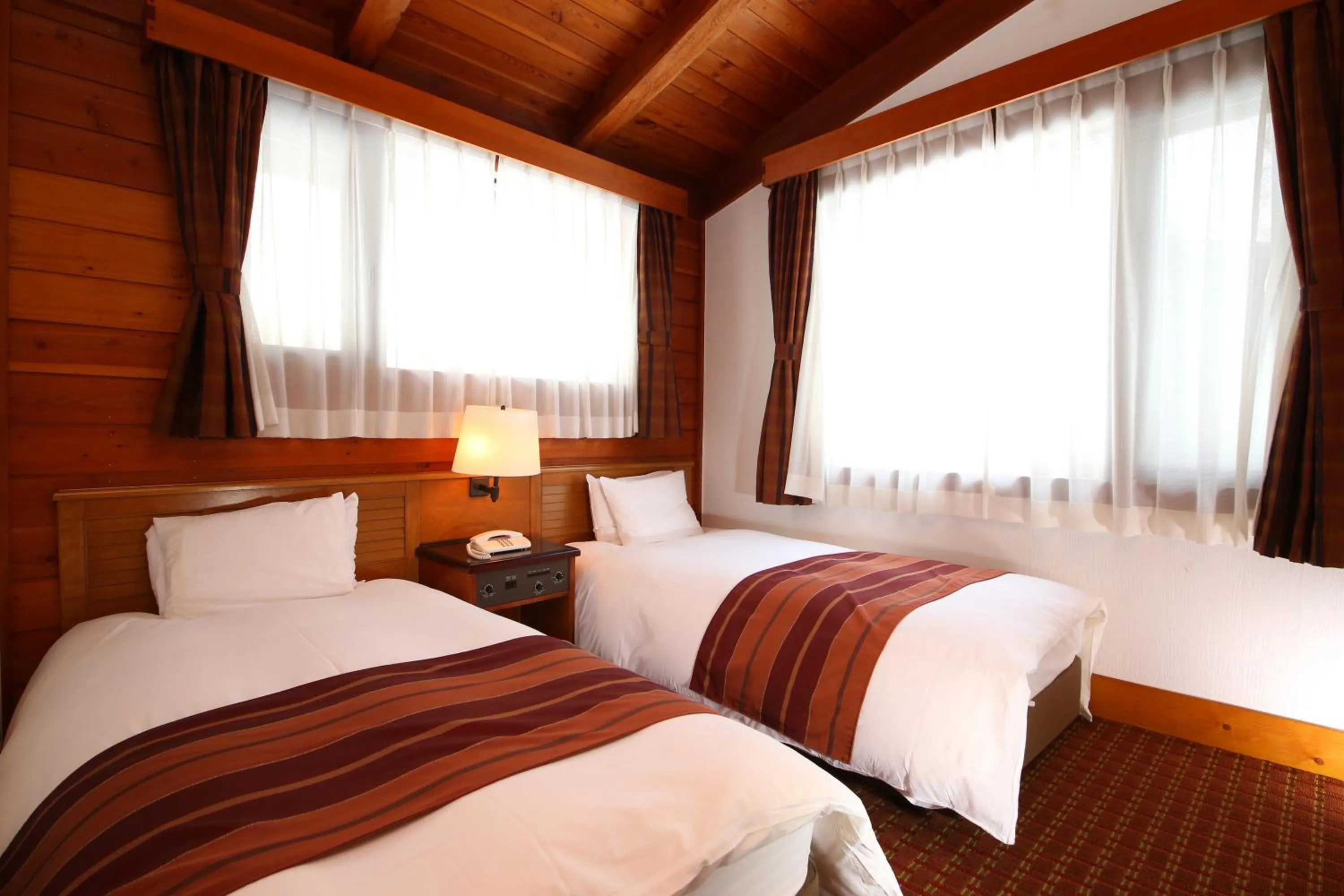 Bed in Tateshina Tokyu Hotel