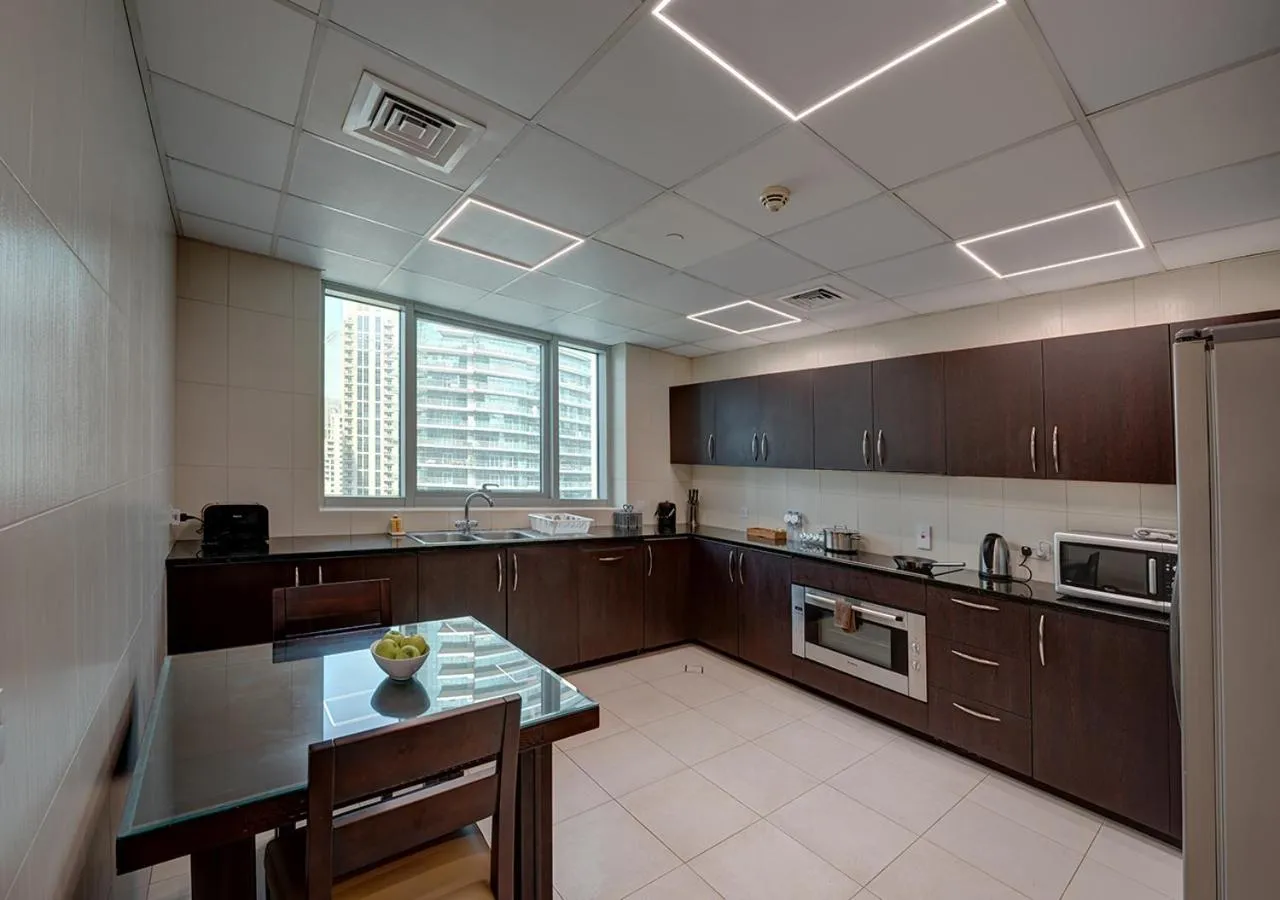 Kitchen or kitchenette in Marina Hotel Apartments