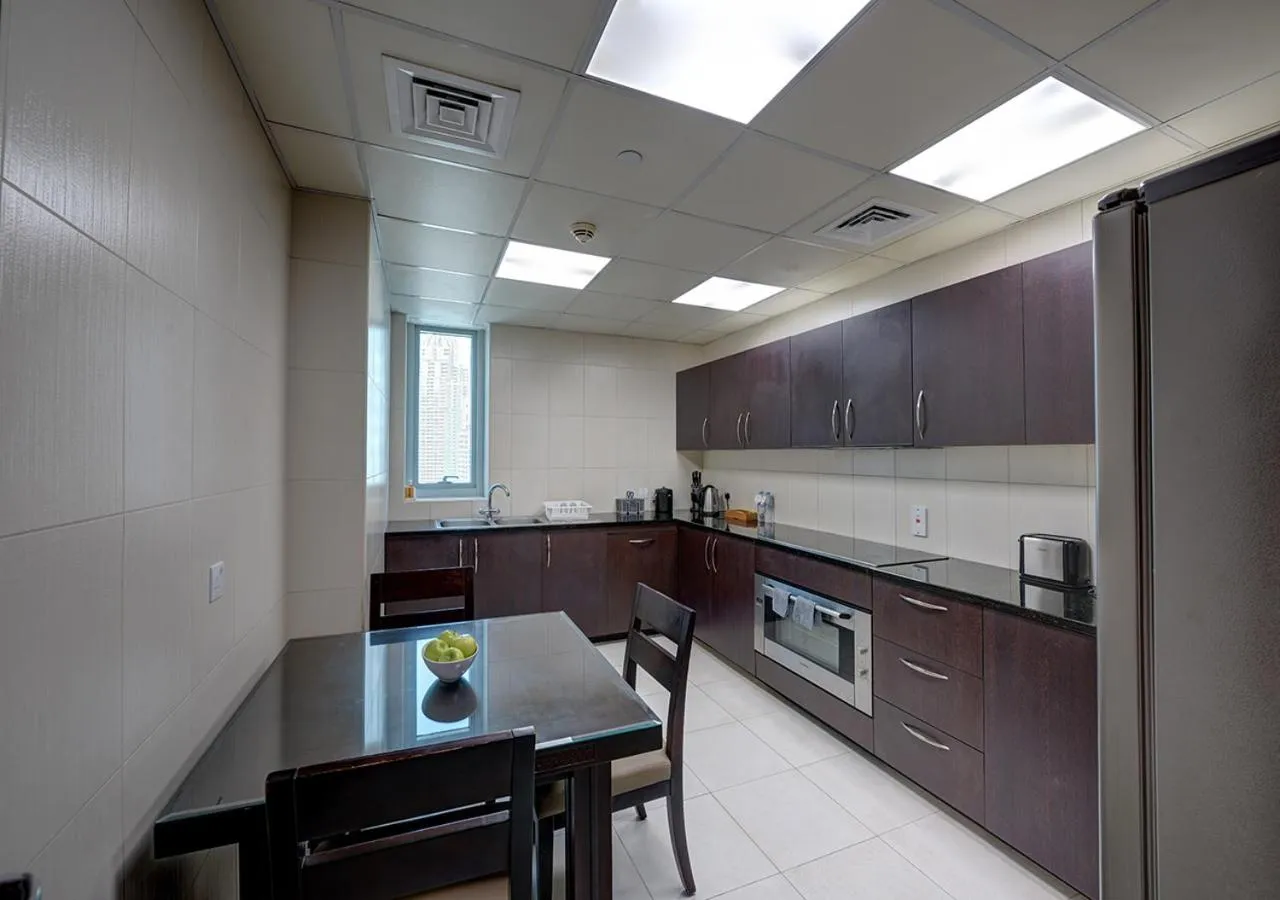 Kitchen or kitchenette in Marina Hotel Apartments