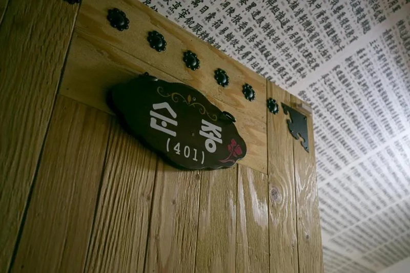 Property logo or sign in Ddlanche Guesthouse New Building