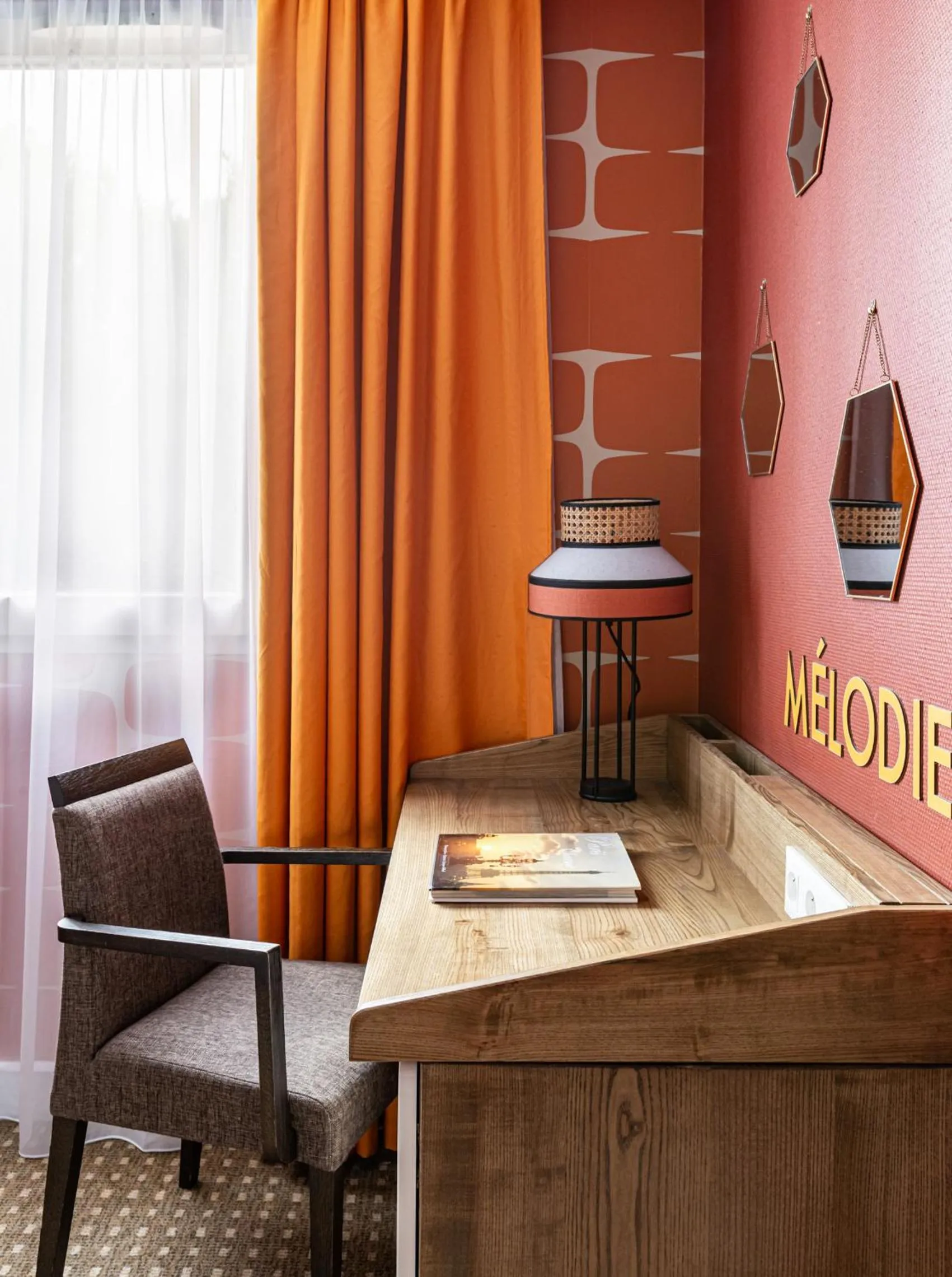 Seating area in Aiden by Best Western Paris Roissy CDG