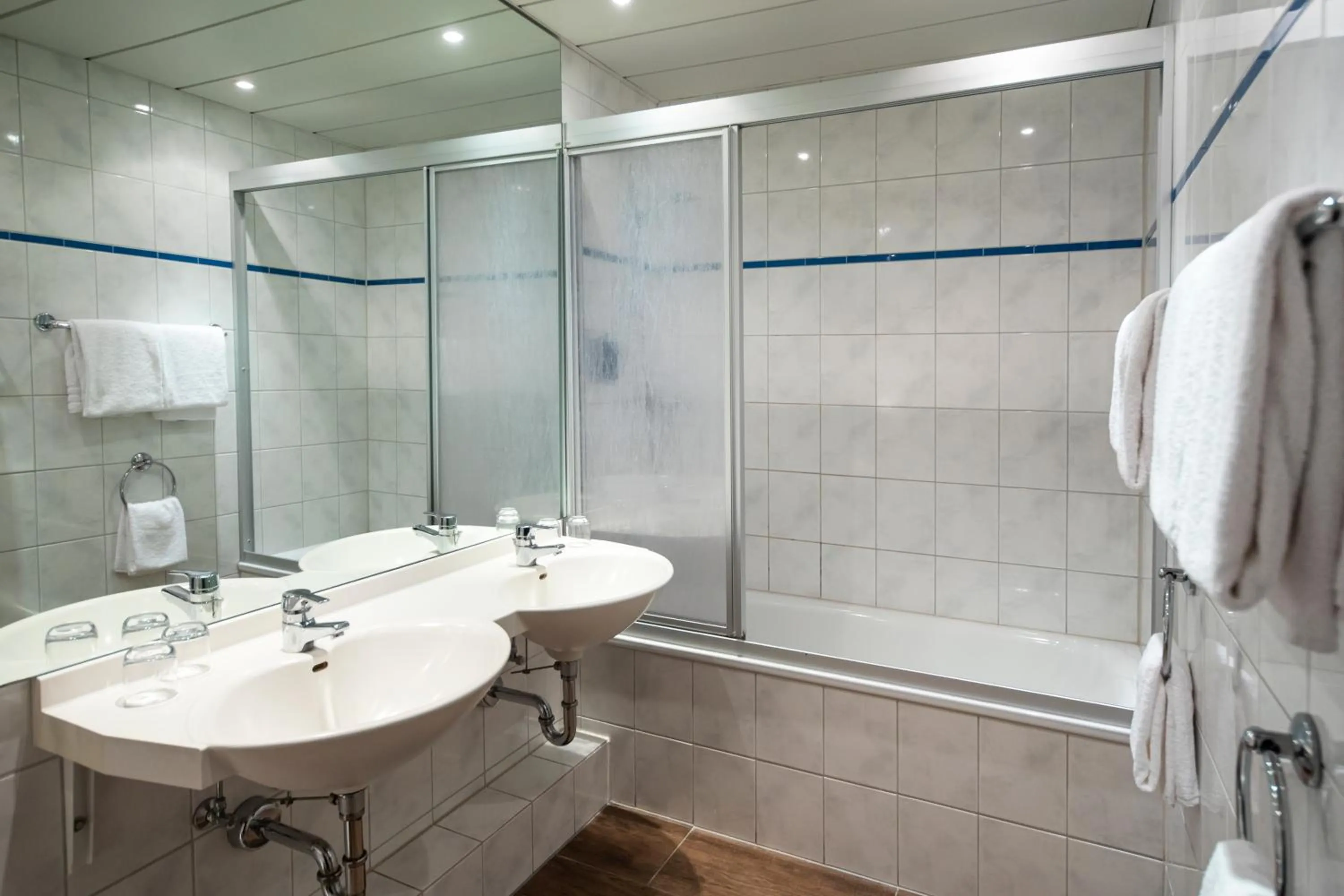 Bathroom in Roomingtons Lüneburger Heide