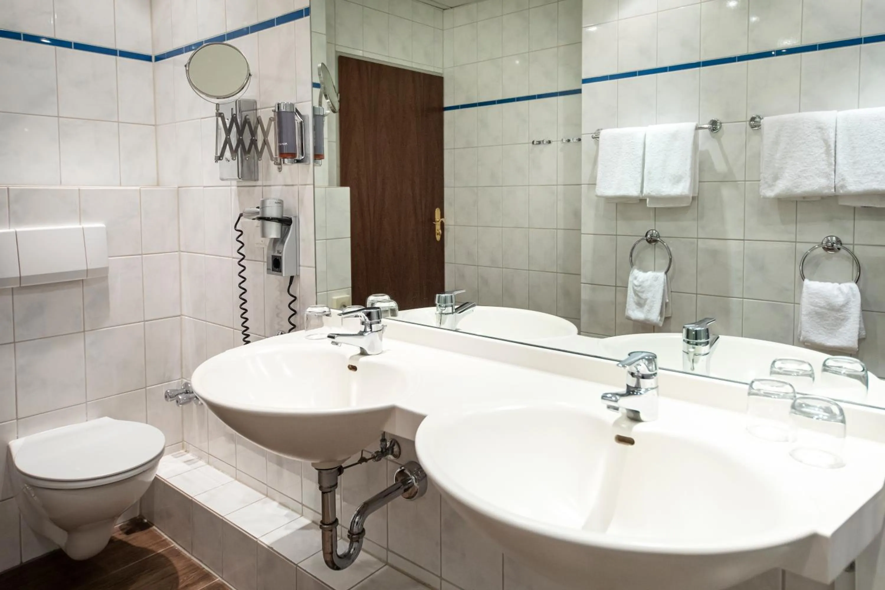 Bathroom in Roomingtons Lüneburger Heide