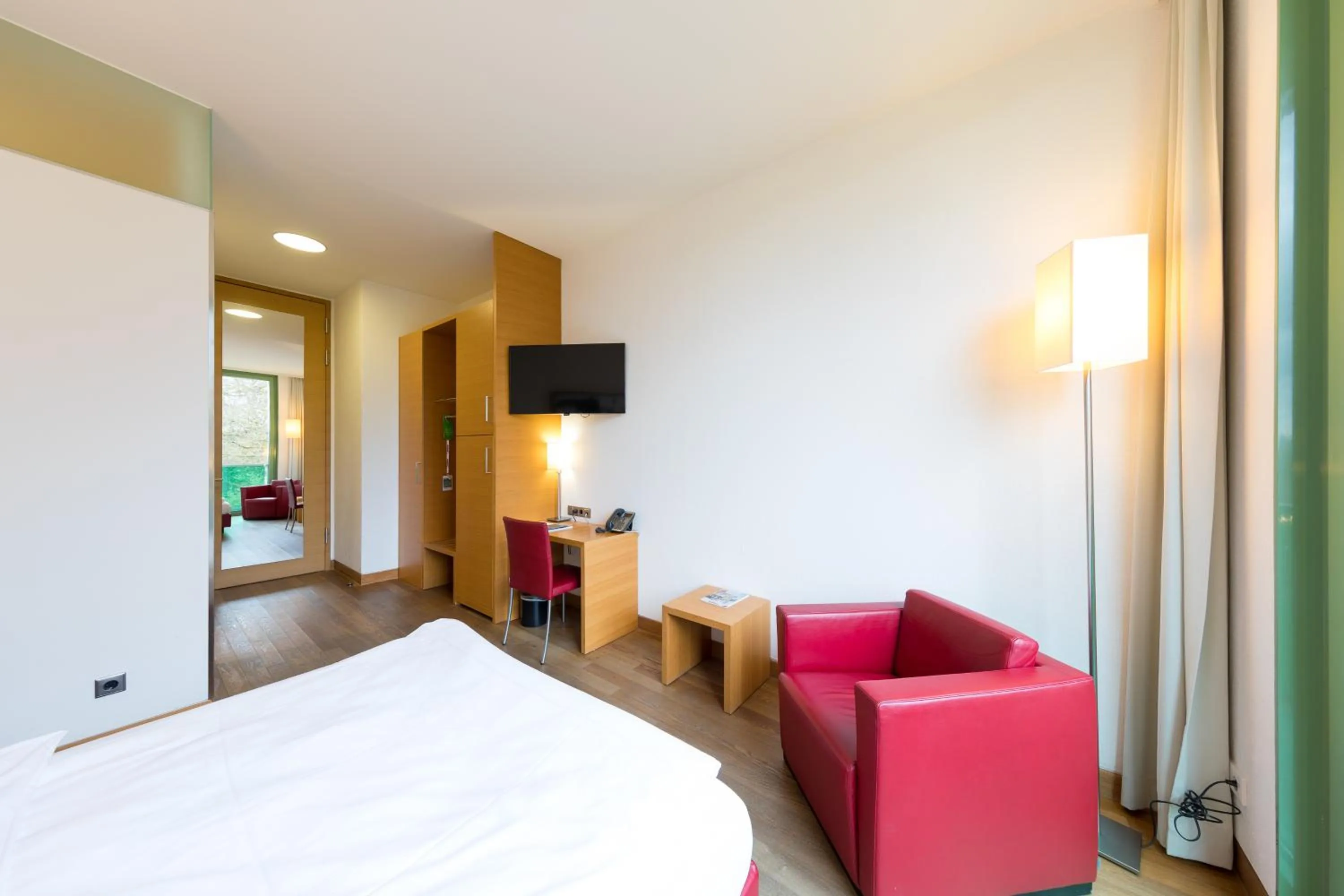 Photo of the whole room, Bed in Schlossparkhotel Mariakirchen