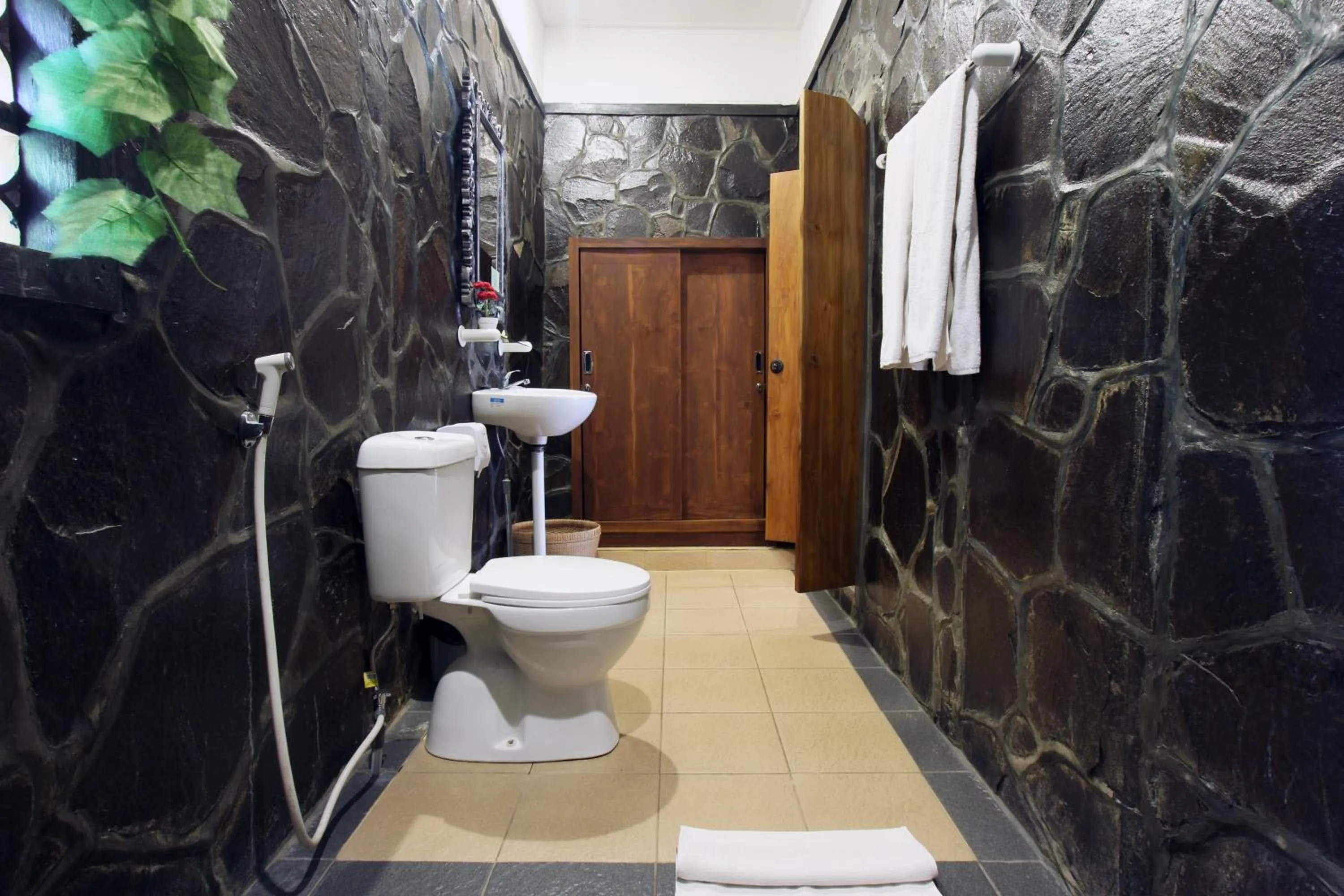 Bathroom in Nara Ubud Cottage by Mahaputra