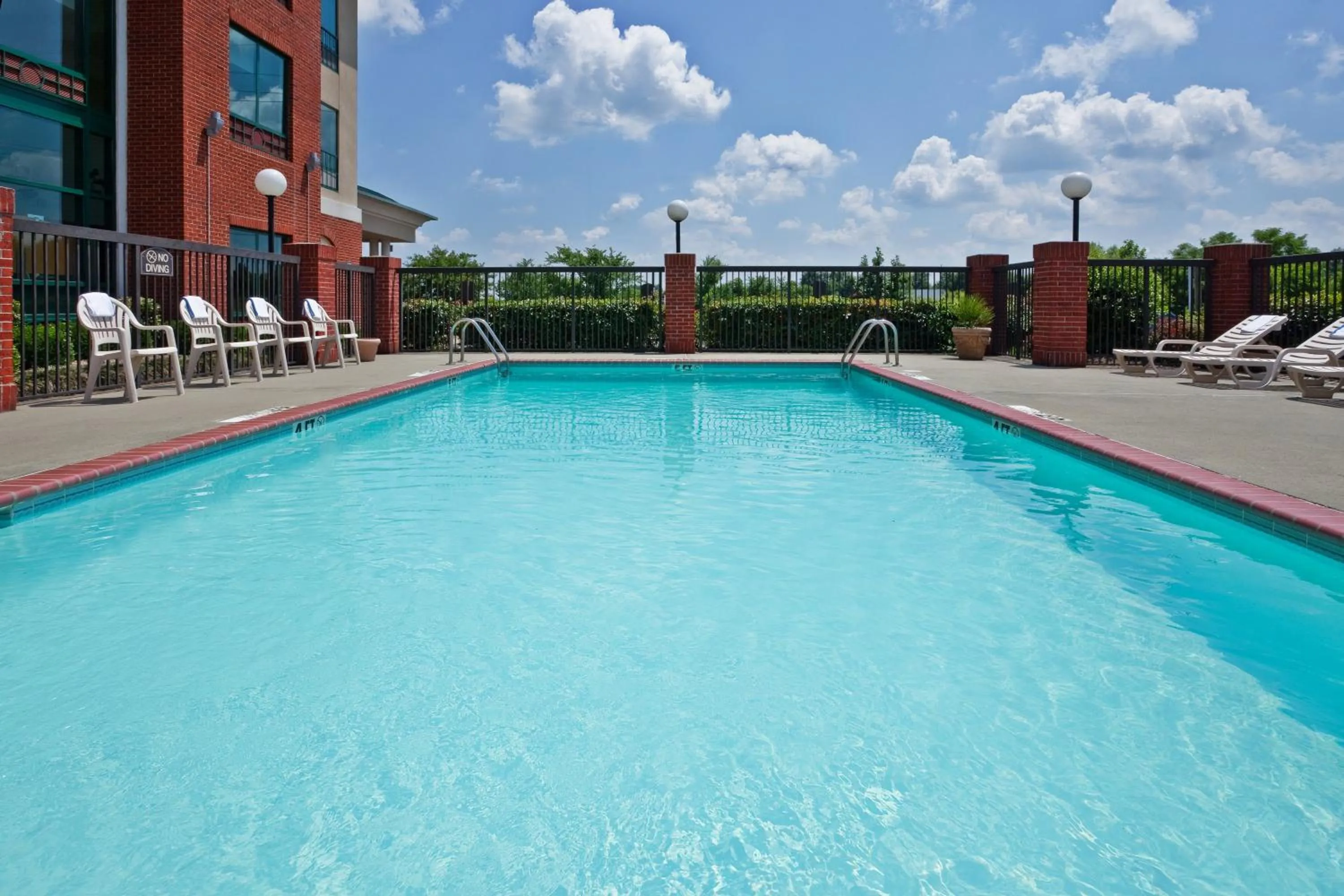Swimming pool in Holiday Inn Express Hotel & Suites Olive Branch by IHG