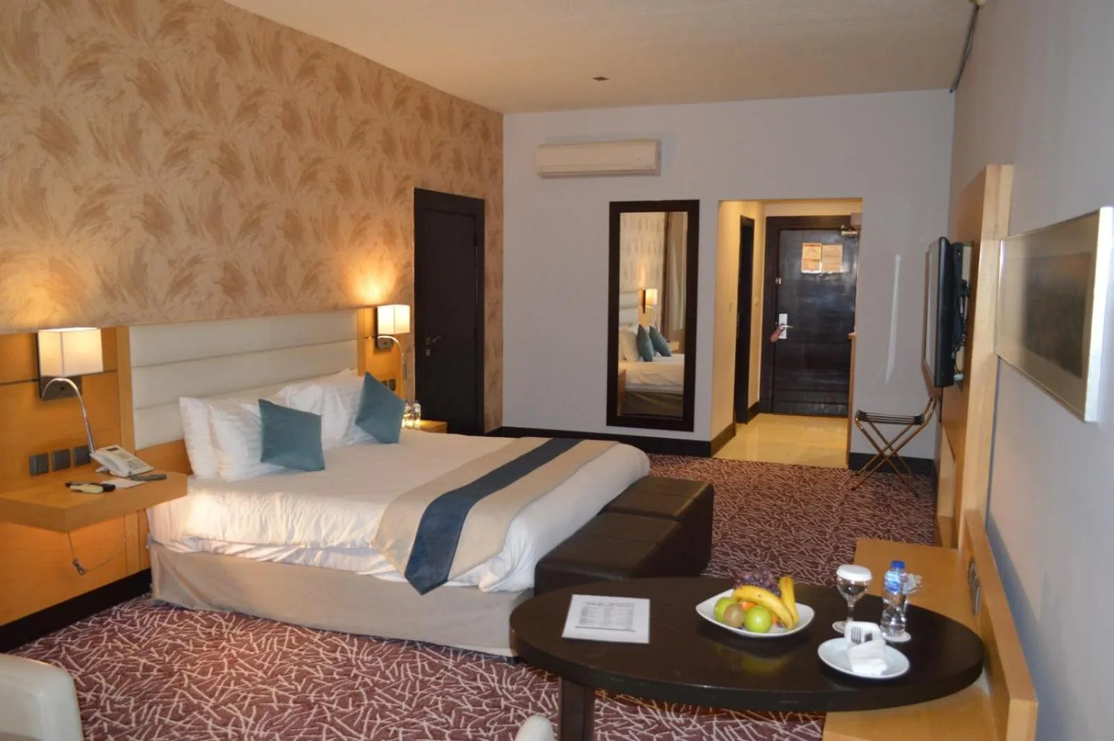 Bed in Golden Tulip Hail