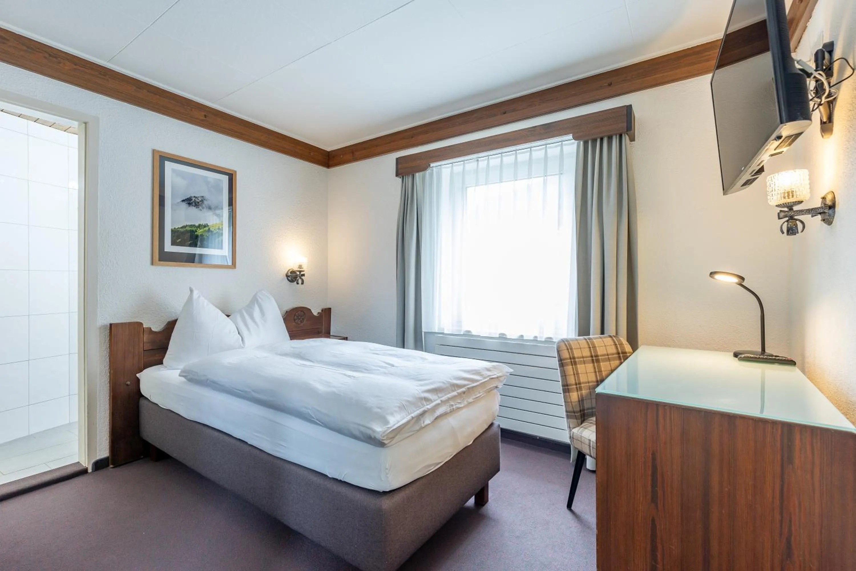 Photo of the whole room, Bed in Hotel Dischma