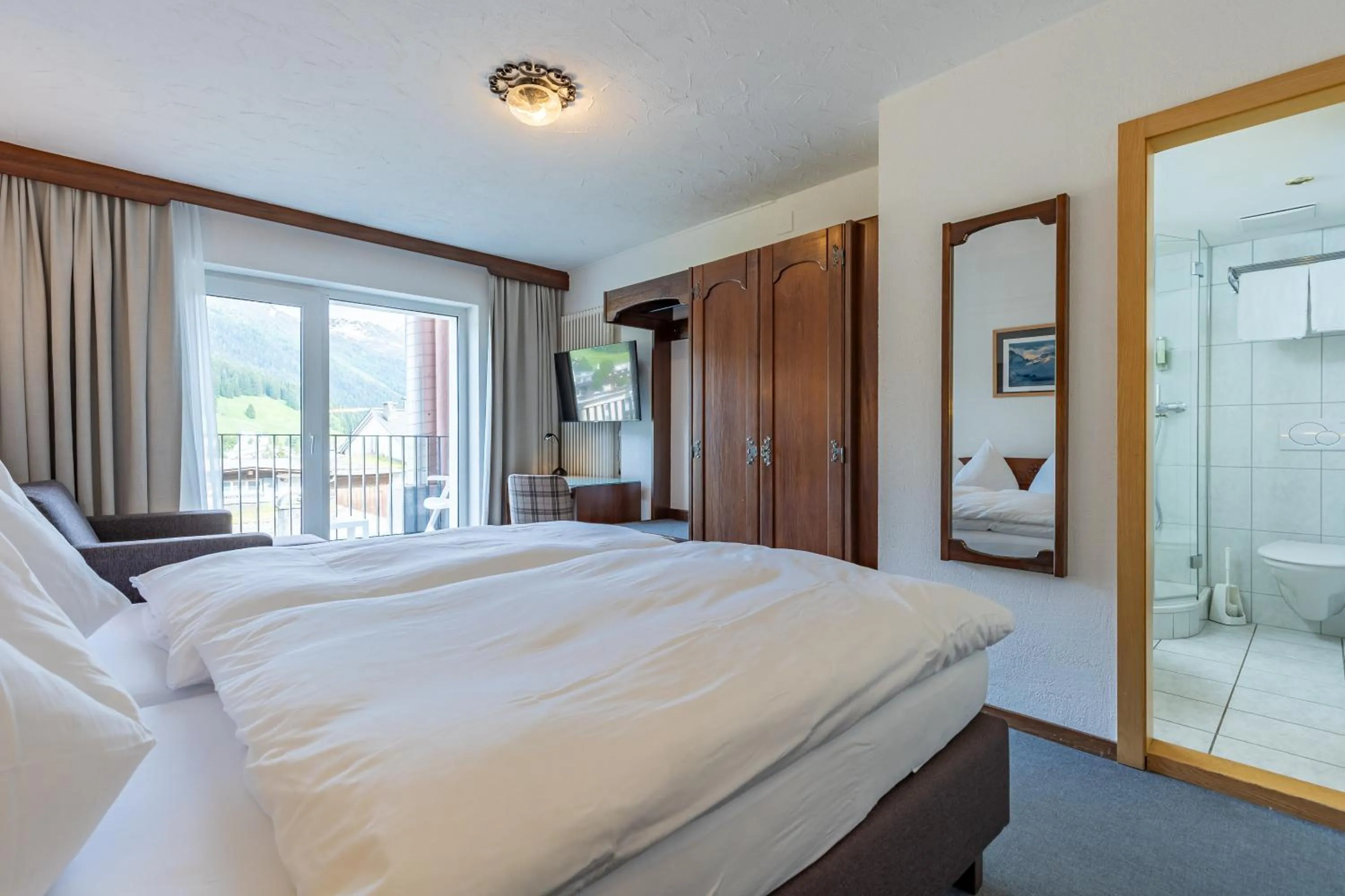 Photo of the whole room, Bed in Hotel Dischma