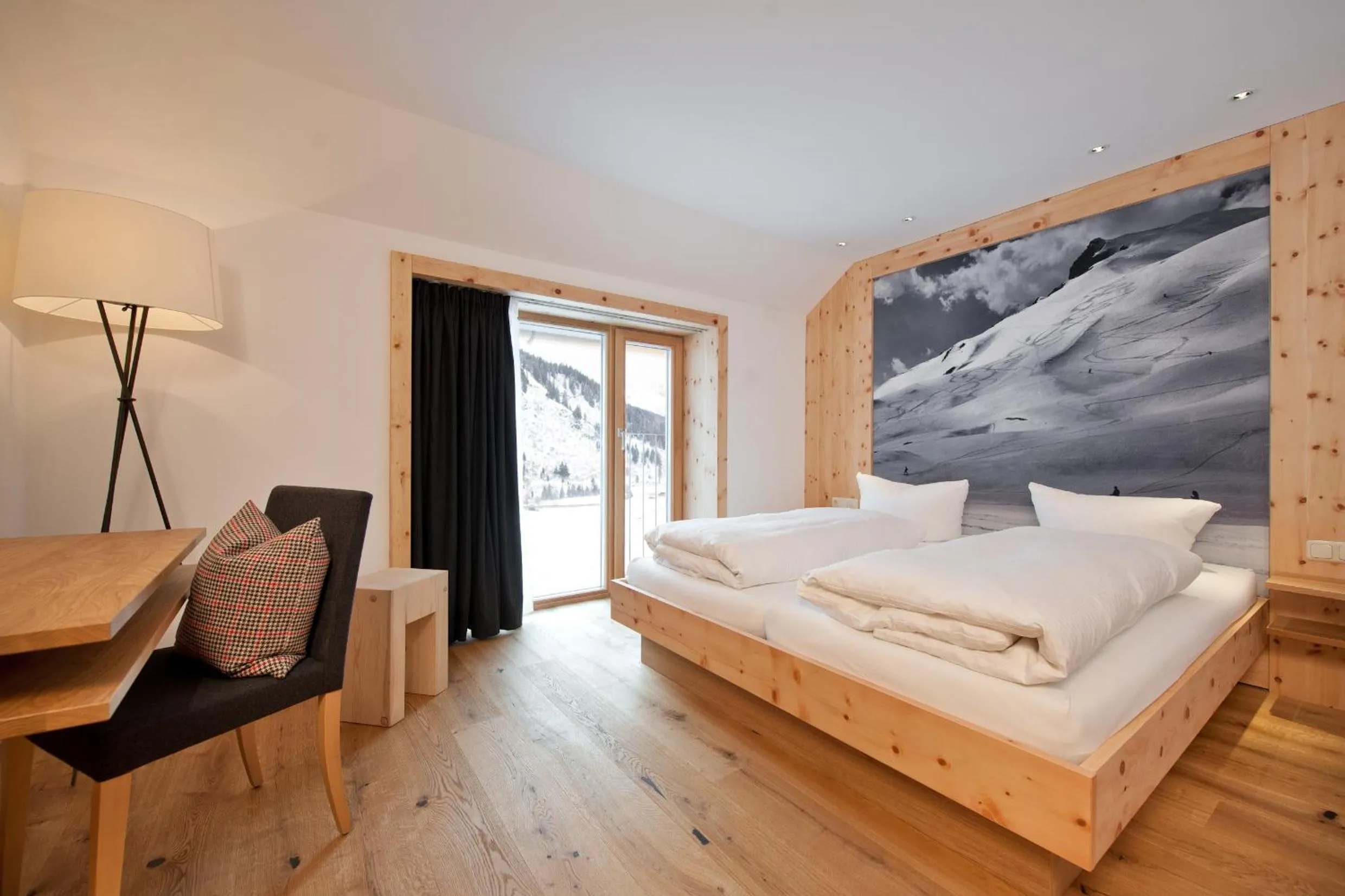 Photo of the whole room, Bed in Mondschein Hotel & Chalet